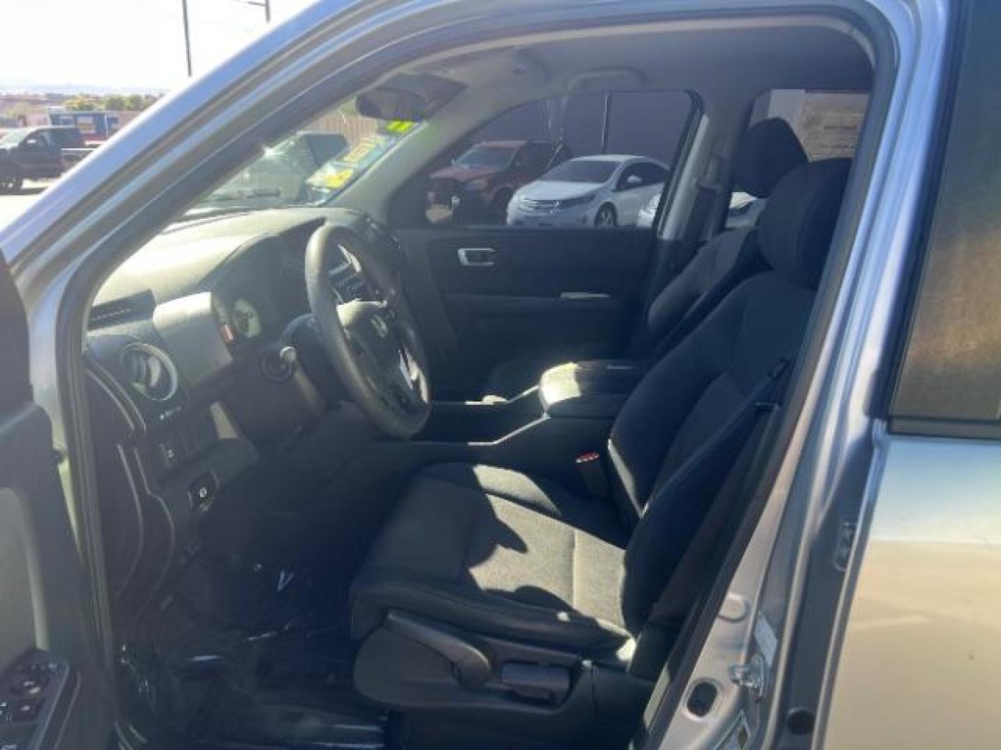 2011 Alabaster Silver Metallic /Gray Cloth Interior Honda Pilot LX 2WD 5-Spd AT (5FNYF3H23BB) with an 3.5L V6 SOHC 24V engine, 5-Speed Automatic transmission, located at 1865 East Red Hills Pkwy, St. George, 84770, (435) 628-0023, 37.120850, -113.543640 - We specialize in helping ALL people get the best financing available. No matter your credit score, good, bad or none we can get you an amazing rate. Had a bankruptcy, divorce, or repossessions? We give you the green light to get your credit back on the road. Low down and affordable payments that fit - Photo#14