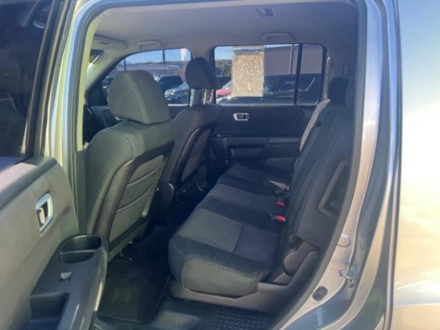 2011 Alabaster Silver Metallic /Gray Cloth Interior Honda Pilot LX 2WD 5-Spd AT (5FNYF3H23BB) with an 3.5L V6 SOHC 24V engine, 5-Speed Automatic transmission, located at 1865 East Red Hills Pkwy, St. George, 84770, (435) 628-0023, 37.120850, -113.543640 - We specialize in helping ALL people get the best financing available. No matter your credit score, good, bad or none we can get you an amazing rate. Had a bankruptcy, divorce, or repossessions? We give you the green light to get your credit back on the road. Low down and affordable payments that fit - Photo#21