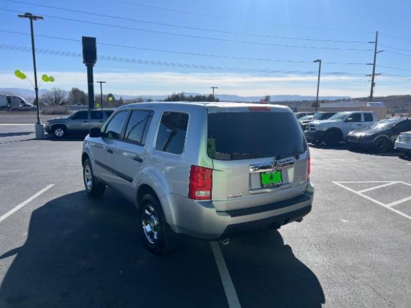 2011 Alabaster Silver Metallic /Gray Cloth Interior Honda Pilot LX 2WD 5-Spd AT (5FNYF3H23BB) with an 3.5L V6 SOHC 24V engine, 5-Speed Automatic transmission, located at 1865 East Red Hills Pkwy, St. George, 84770, (435) 628-0023, 37.120850, -113.543640 - We specialize in helping ALL people get the best financing available. No matter your credit score, good, bad or none we can get you an amazing rate. Had a bankruptcy, divorce, or repossessions? We give you the green light to get your credit back on the road. Low down and affordable payments that fit - Photo#4
