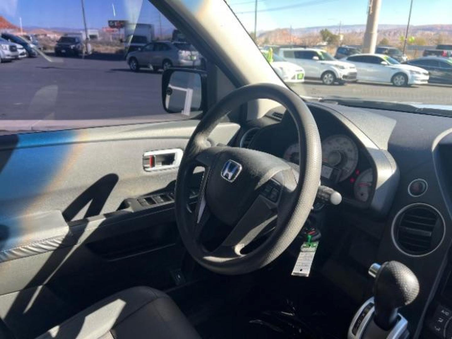 2011 Alabaster Silver Metallic /Gray Cloth Interior Honda Pilot LX 2WD 5-Spd AT (5FNYF3H23BB) with an 3.5L V6 SOHC 24V engine, 5-Speed Automatic transmission, located at 1865 East Red Hills Pkwy, St. George, 84770, (435) 628-0023, 37.120850, -113.543640 - We specialize in helping ALL people get the best financing available. No matter your credit score, good, bad or none we can get you an amazing rate. Had a bankruptcy, divorce, or repossessions? We give you the green light to get your credit back on the road. Low down and affordable payments that fit - Photo#33