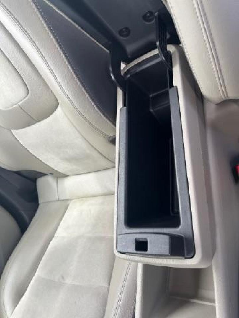 2014 Light Blue /Tan Cloth Interior Chevrolet Volt Premium w/ Navigation and LEP (1G1RH6E45EU) with an 1.4L L4 DOHC 16V PLUG-IN HYBRID engine, Continuously Variable Transmission transmission, located at 940 North Main Street, Cedar City, UT, 84720, (435) 628-0023, 37.692936, -113.061897 - Photo#19