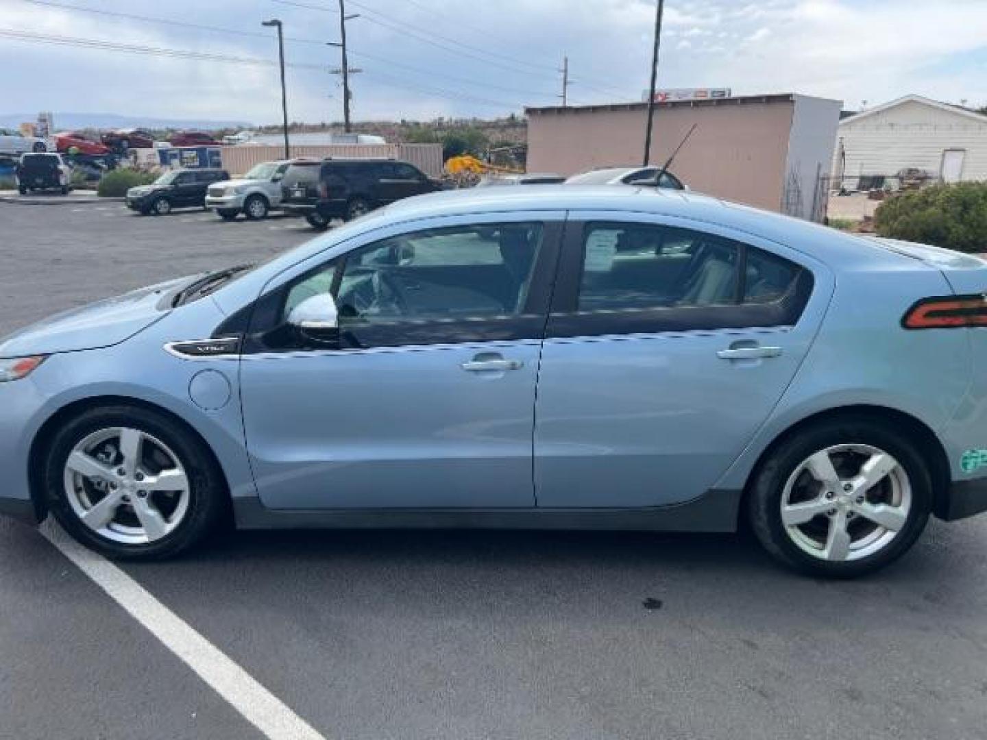2014 Light Blue /Tan Cloth Interior Chevrolet Volt Premium w/ Navigation and LEP (1G1RH6E45EU) with an 1.4L L4 DOHC 16V PLUG-IN HYBRID engine, Continuously Variable Transmission transmission, located at 940 North Main Street, Cedar City, UT, 84720, (435) 628-0023, 37.692936, -113.061897 - Photo#3