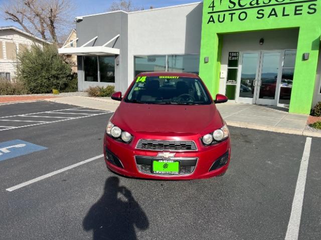 2014 Crystal Red Tintcoat /Jet Black/Brick Chevrolet Sonic LT Auto Sedan (1G1JC5SH5E4) with an 1.8L L4 DOHC 24V engine, 6-Speed Automatic transmission, located at 940 North Main Street, Cedar City, UT, 84720, (435) 628-0023, 37.692936, -113.061897 - We specialize in helping ALL people get the best financing available. No matter your credit score, good, bad or none we can get you an amazing rate. Had a bankruptcy, divorce, or repossessions? We give you the green light to get your credit back on the road. Low down and affordable payments that fit - Photo#1