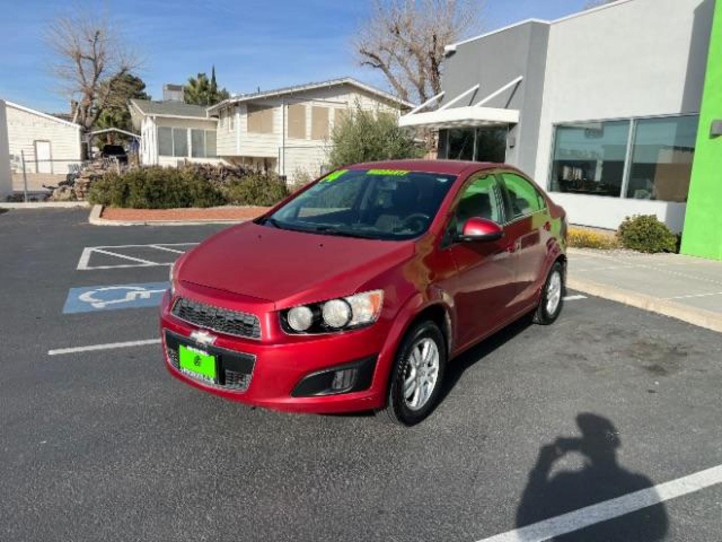 2014 Crystal Red Tintcoat /Jet Black/Brick Chevrolet Sonic LT Auto Sedan (1G1JC5SH5E4) with an 1.8L L4 DOHC 24V engine, 6-Speed Automatic transmission, located at 1865 East Red Hills Pkwy, St. George, 84770, (435) 628-0023, 37.120850, -113.543640 - We specialize in helping ALL people get the best financing available. No matter your credit score, good, bad or none we can get you an amazing rate. Had a bankruptcy, divorce, or repossessions? We give you the green light to get your credit back on the road. Low down and affordable payments that fit - Photo#2