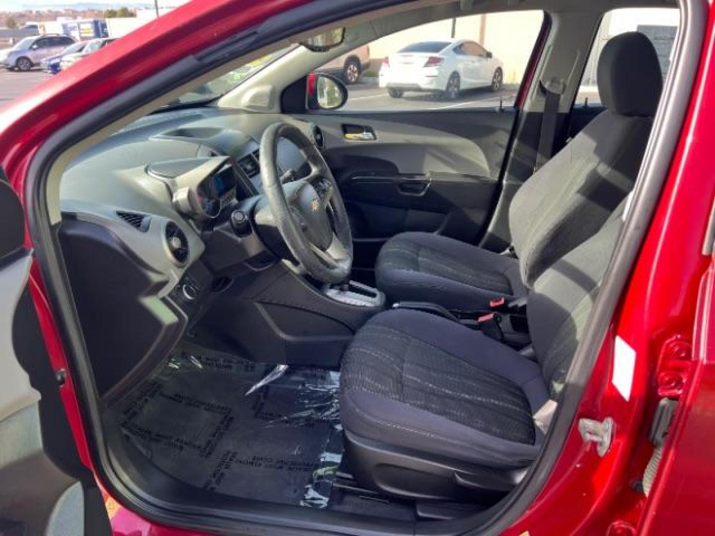 2014 Crystal Red Tintcoat /Jet Black/Brick Chevrolet Sonic LT Auto Sedan (1G1JC5SH5E4) with an 1.8L L4 DOHC 24V engine, 6-Speed Automatic transmission, located at 1865 East Red Hills Pkwy, St. George, 84770, (435) 628-0023, 37.120850, -113.543640 - We specialize in helping ALL people get the best financing available. No matter your credit score, good, bad or none we can get you an amazing rate. Had a bankruptcy, divorce, or repossessions? We give you the green light to get your credit back on the road. Low down and affordable payments that fit - Photo#14