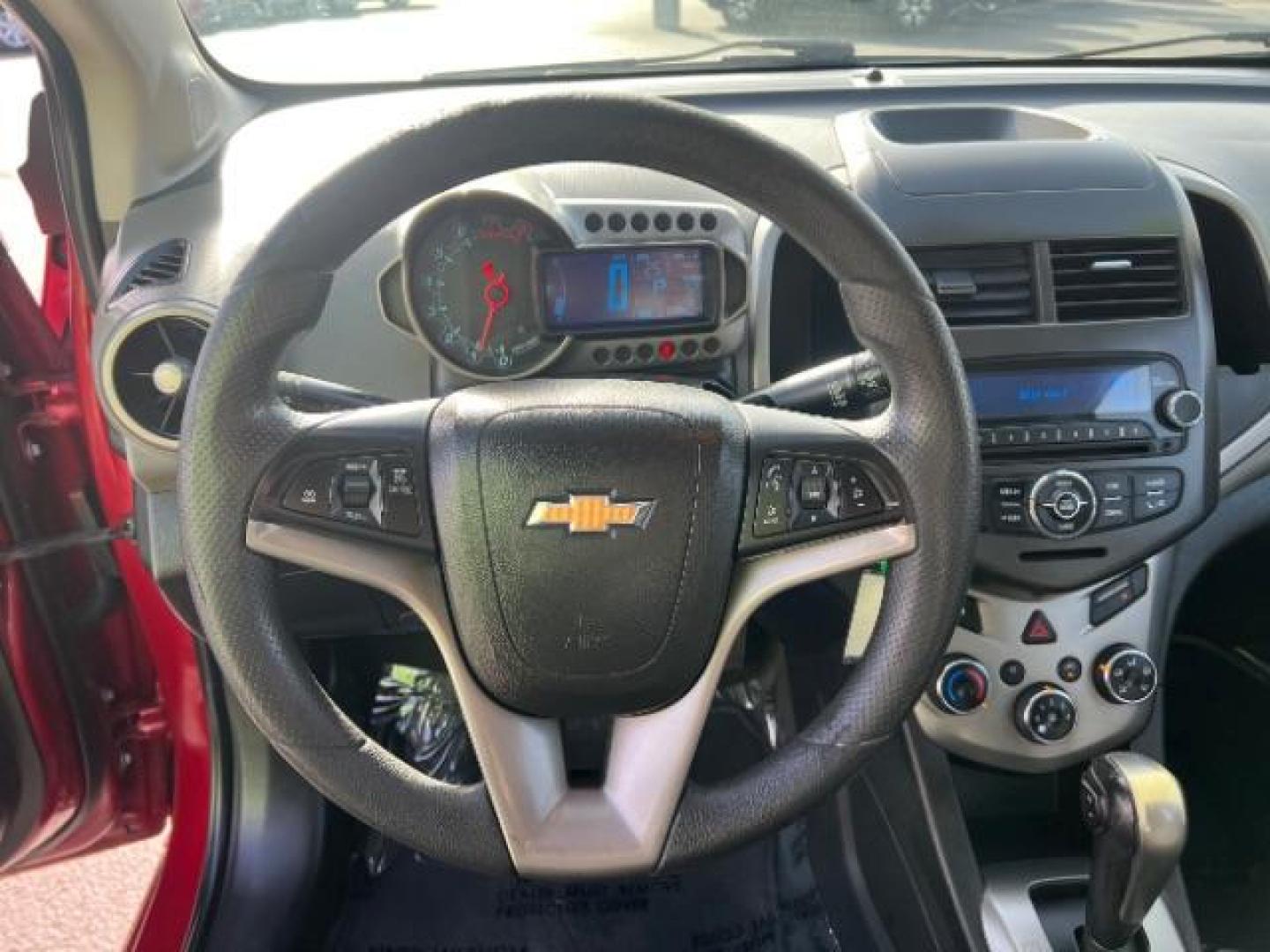 2014 Crystal Red Tintcoat /Jet Black/Brick Chevrolet Sonic LT Auto Sedan (1G1JC5SH5E4) with an 1.8L L4 DOHC 24V engine, 6-Speed Automatic transmission, located at 1865 East Red Hills Pkwy, St. George, 84770, (435) 628-0023, 37.120850, -113.543640 - We specialize in helping ALL people get the best financing available. No matter your credit score, good, bad or none we can get you an amazing rate. Had a bankruptcy, divorce, or repossessions? We give you the green light to get your credit back on the road. Low down and affordable payments that fit - Photo#15