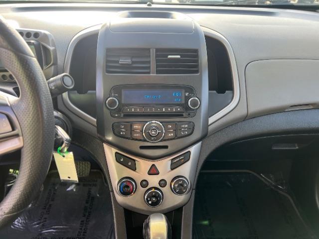 2014 Crystal Red Tintcoat /Jet Black/Brick Chevrolet Sonic LT Auto Sedan (1G1JC5SH5E4) with an 1.8L L4 DOHC 24V engine, 6-Speed Automatic transmission, located at 940 North Main Street, Cedar City, UT, 84720, (435) 628-0023, 37.692936, -113.061897 - We specialize in helping ALL people get the best financing available. No matter your credit score, good, bad or none we can get you an amazing rate. Had a bankruptcy, divorce, or repossessions? We give you the green light to get your credit back on the road. Low down and affordable payments that fit - Photo#17