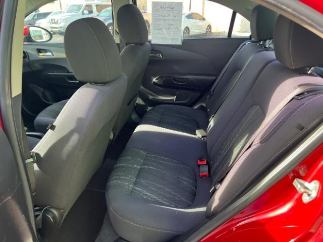 2014 Crystal Red Tintcoat /Jet Black/Brick Chevrolet Sonic LT Auto Sedan (1G1JC5SH5E4) with an 1.8L L4 DOHC 24V engine, 6-Speed Automatic transmission, located at 940 North Main Street, Cedar City, UT, 84720, (435) 628-0023, 37.692936, -113.061897 - We specialize in helping ALL people get the best financing available. No matter your credit score, good, bad or none we can get you an amazing rate. Had a bankruptcy, divorce, or repossessions? We give you the green light to get your credit back on the road. Low down and affordable payments that fit - Photo#20