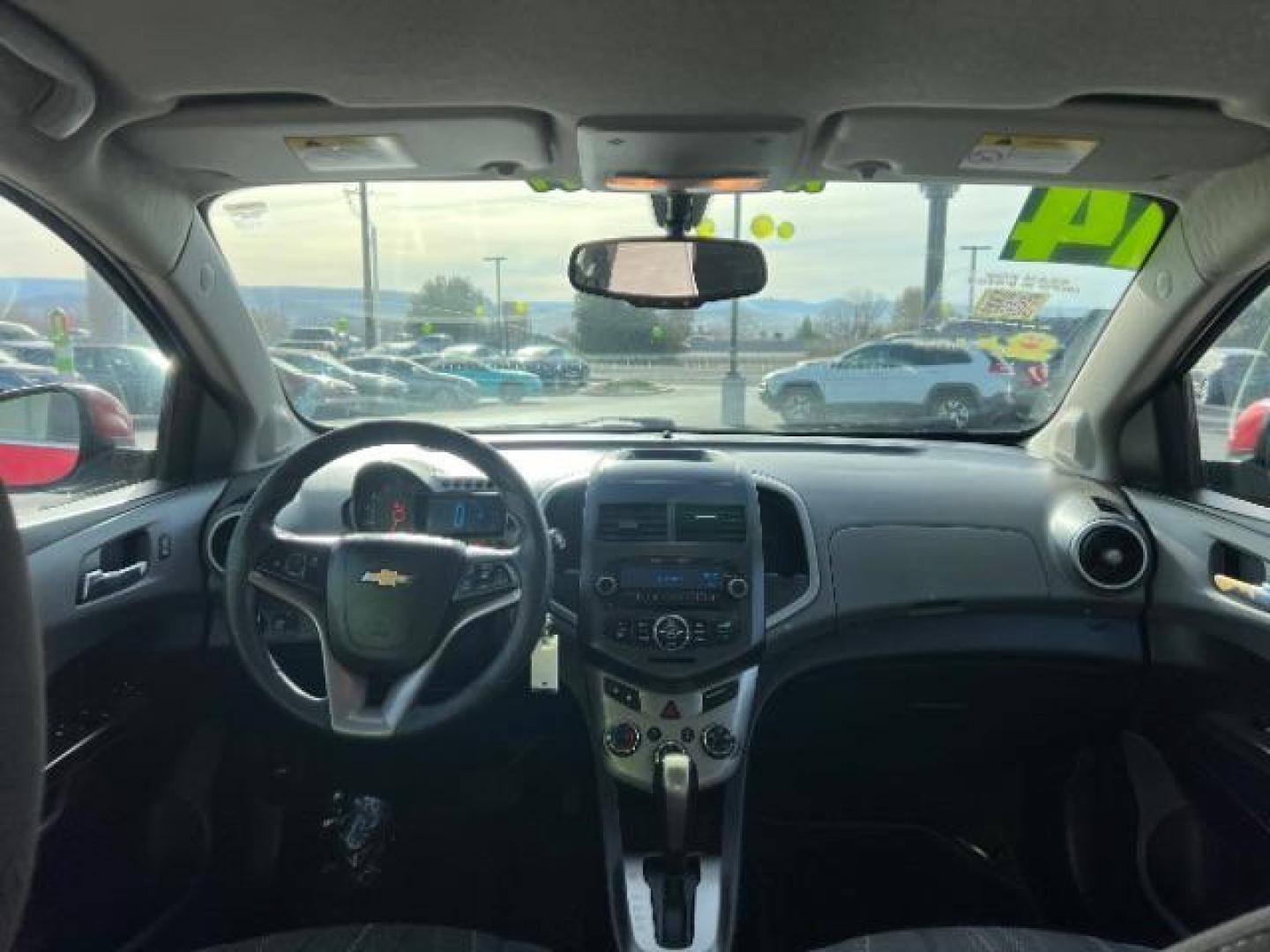 2014 Crystal Red Tintcoat /Jet Black/Brick Chevrolet Sonic LT Auto Sedan (1G1JC5SH5E4) with an 1.8L L4 DOHC 24V engine, 6-Speed Automatic transmission, located at 1865 East Red Hills Pkwy, St. George, 84770, (435) 628-0023, 37.120850, -113.543640 - We specialize in helping ALL people get the best financing available. No matter your credit score, good, bad or none we can get you an amazing rate. Had a bankruptcy, divorce, or repossessions? We give you the green light to get your credit back on the road. Low down and affordable payments that fit - Photo#21