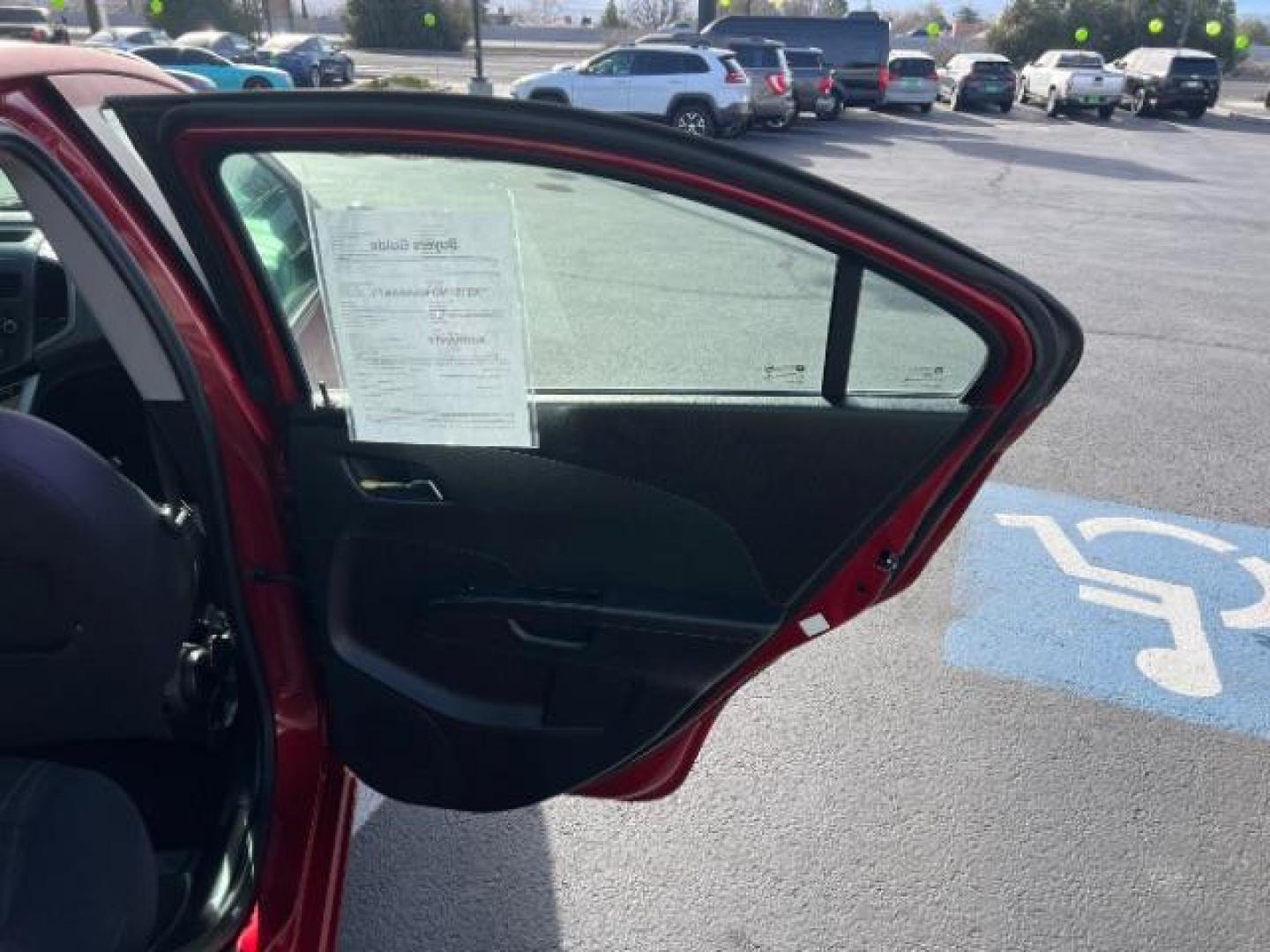 2014 Crystal Red Tintcoat /Jet Black/Brick Chevrolet Sonic LT Auto Sedan (1G1JC5SH5E4) with an 1.8L L4 DOHC 24V engine, 6-Speed Automatic transmission, located at 1865 East Red Hills Pkwy, St. George, 84770, (435) 628-0023, 37.120850, -113.543640 - We specialize in helping ALL people get the best financing available. No matter your credit score, good, bad or none we can get you an amazing rate. Had a bankruptcy, divorce, or repossessions? We give you the green light to get your credit back on the road. Low down and affordable payments that fit - Photo#22