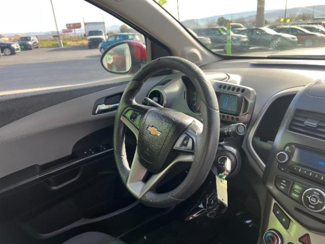 2014 Crystal Red Tintcoat /Jet Black/Brick Chevrolet Sonic LT Auto Sedan (1G1JC5SH5E4) with an 1.8L L4 DOHC 24V engine, 6-Speed Automatic transmission, located at 940 North Main Street, Cedar City, UT, 84720, (435) 628-0023, 37.692936, -113.061897 - We specialize in helping ALL people get the best financing available. No matter your credit score, good, bad or none we can get you an amazing rate. Had a bankruptcy, divorce, or repossessions? We give you the green light to get your credit back on the road. Low down and affordable payments that fit - Photo#28