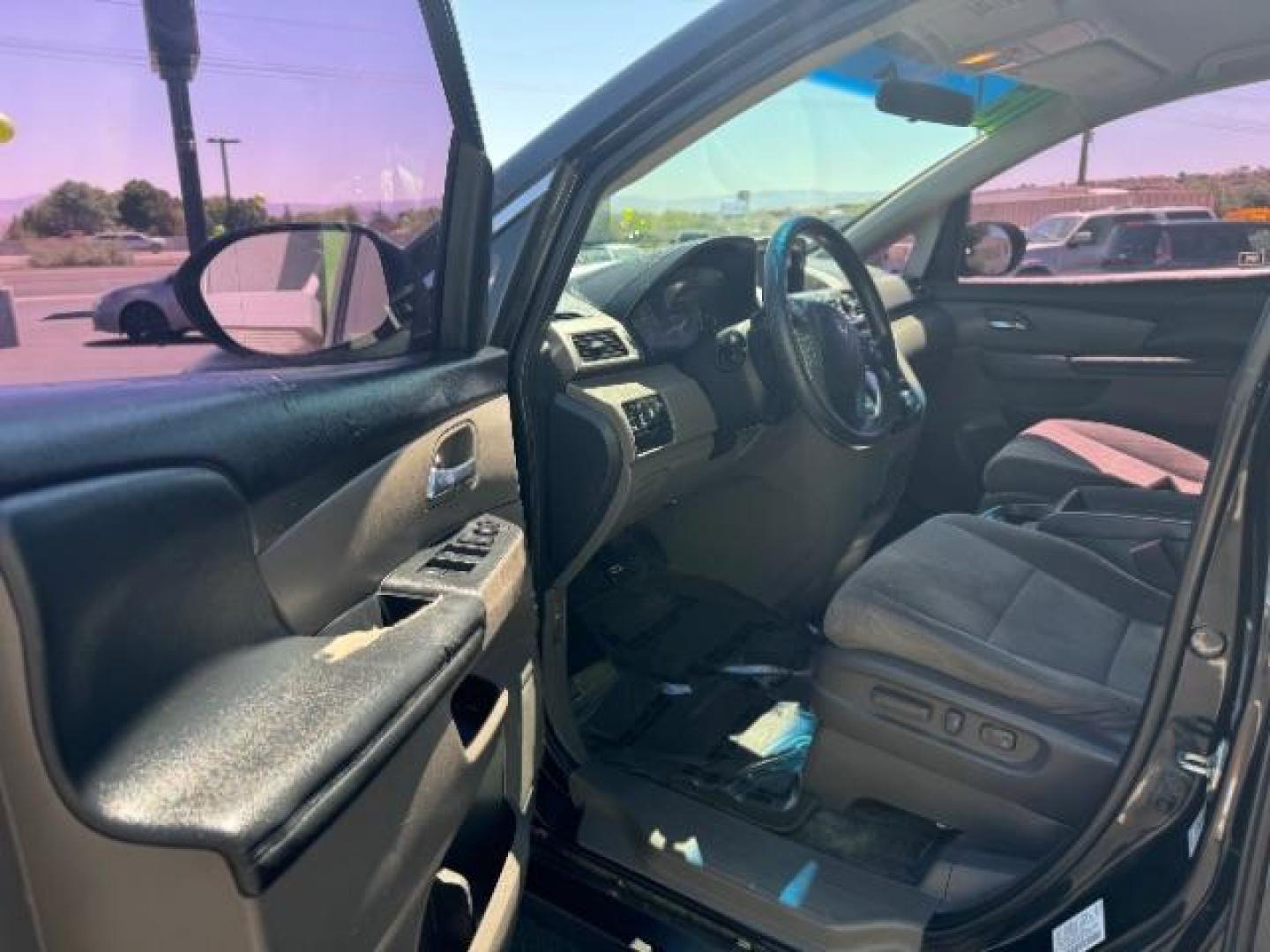 2016 Crystal Black Pearl /Truffle, cloth Honda Odyssey SE (5FNRL5H36GB) with an 3.5L V6 SOHC 24V engine, 6-Speed Automatic transmission, located at 1865 East Red Hills Pkwy, St. George, 84770, (435) 628-0023, 37.120850, -113.543640 - We specialize in helping ALL people get the best financing available. No matter your credit score, good, bad or none we can get you an amazing rate. Had a bankruptcy, divorce, or repossessions? We give you the green light to get your credit back on the road. Low down and affordable payments that fit - Photo#12