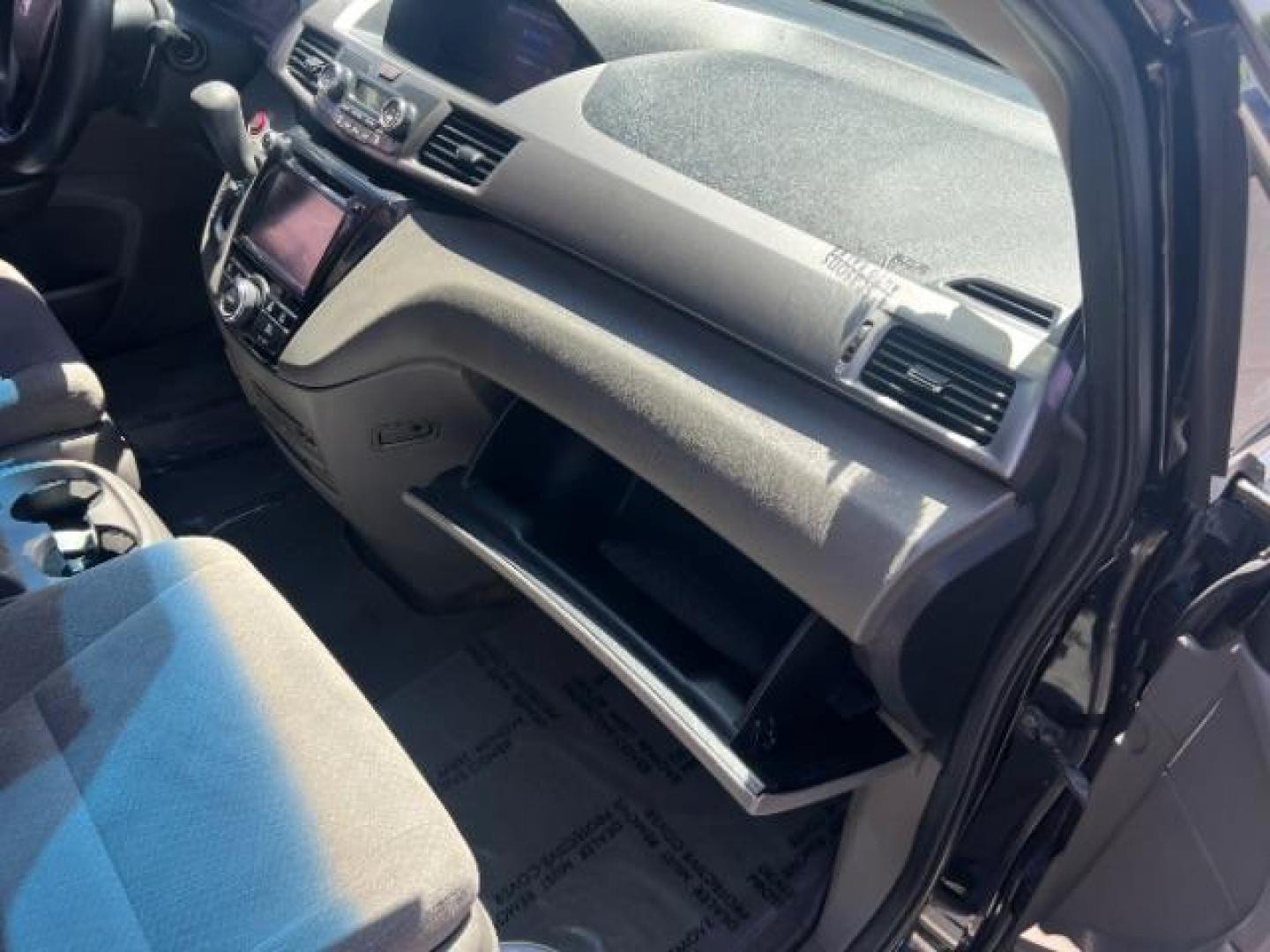 2016 Crystal Black Pearl /Gray, cloth Honda Odyssey SE (5FNRL5H36GB) with an 3.5L V6 SOHC 24V engine, 6-Speed Automatic transmission, located at 940 North Main Street, Cedar City, UT, 84720, (435) 628-0023, 37.692936, -113.061897 - We specialize in helping ALL people get the best financing available. No matter your credit score, good, bad or none we can get you an amazing rate. Had a bankruptcy, divorce, or repossessions? We give you the green light to get your credit back on the road. Low down and affordable payments that fit - Photo#29