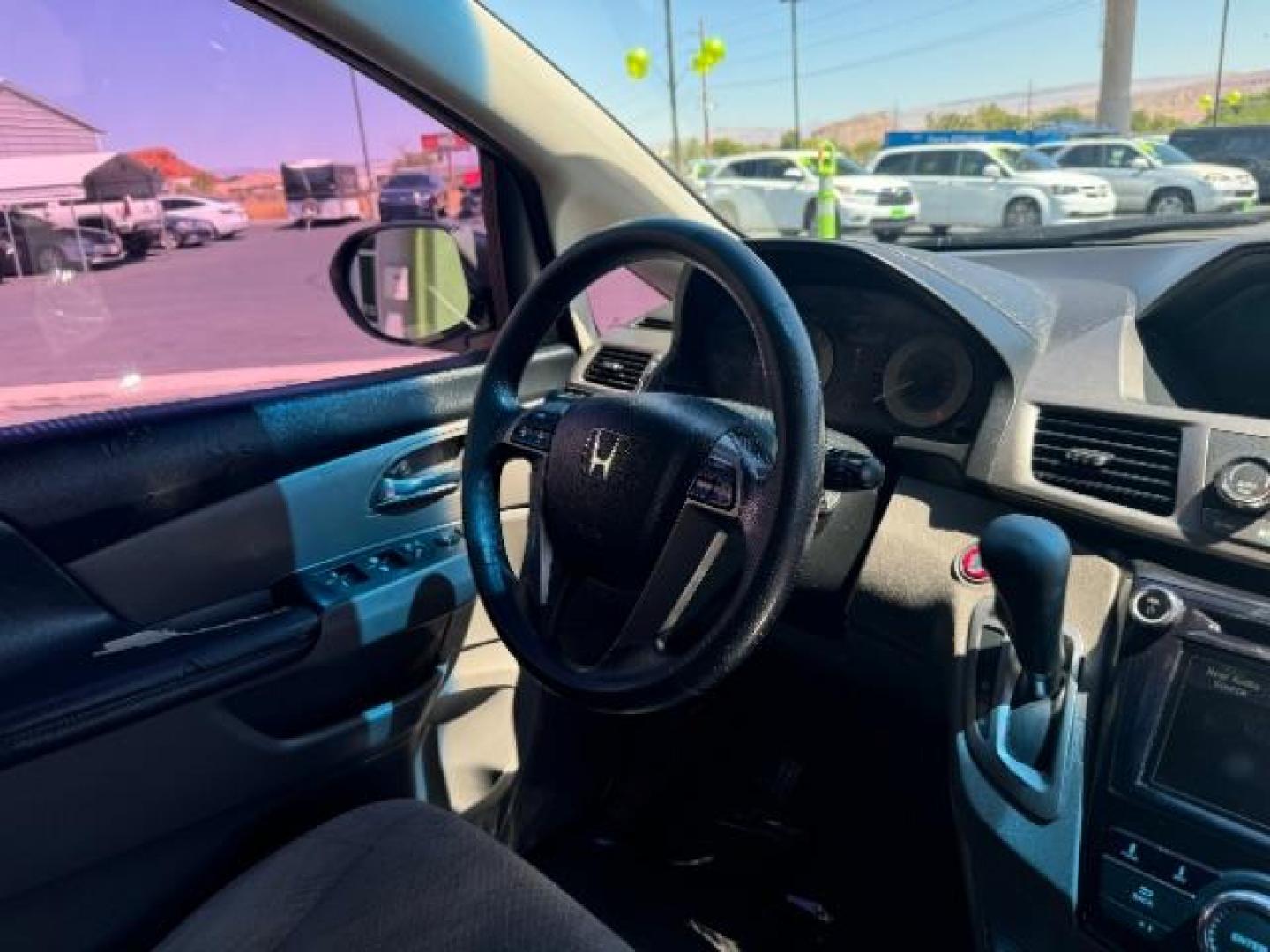 2016 Crystal Black Pearl /Truffle, cloth Honda Odyssey SE (5FNRL5H36GB) with an 3.5L V6 SOHC 24V engine, 6-Speed Automatic transmission, located at 1865 East Red Hills Pkwy, St. George, 84770, (435) 628-0023, 37.120850, -113.543640 - We specialize in helping ALL people get the best financing available. No matter your credit score, good, bad or none we can get you an amazing rate. Had a bankruptcy, divorce, or repossessions? We give you the green light to get your credit back on the road. Low down and affordable payments that fit - Photo#37