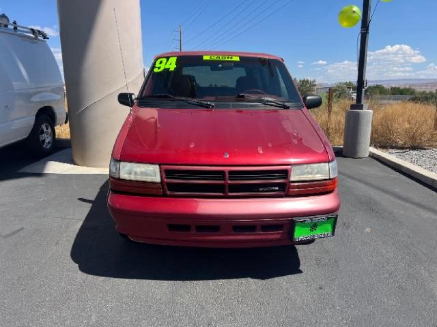 1994 Red /Black Interior Dodge Grand Caravan SE (1B4GH44R7RX) with an 3.3L V6 OHV 12V engine, 4-Speed Automatic transmission, located at 1865 East Red Hills Pkwy, St. George, 84770, (435) 628-0023, 37.120850, -113.543640 - This vehicle is a Wholesale Special. This means it will need some love. Runs a drives fine but has body damage, leaks or other mechanical issues. It did NOT pass our 50 point inspection. Get a great deal on a less than perfect car. These cars do NOT qualify for our in house financing. Cash and carry - Photo#1