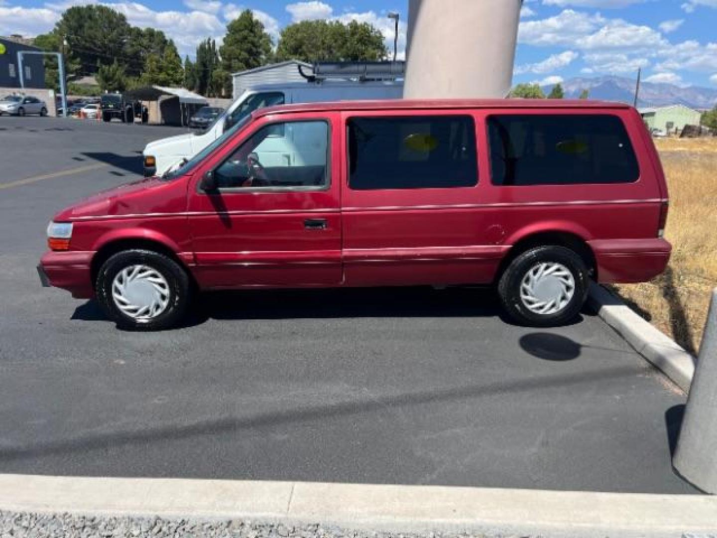 1994 Red /Black Interior Dodge Grand Caravan SE (1B4GH44R7RX) with an 3.3L V6 OHV 12V engine, 4-Speed Automatic transmission, located at 1865 East Red Hills Pkwy, St. George, 84770, (435) 628-0023, 37.120850, -113.543640 - This vehicle is a Wholesale Special. This means it will need some love. Runs a drives fine but has body damage, leaks or other mechanical issues. It did NOT pass our 50 point inspection. Get a great deal on a less than perfect car. These cars do NOT qualify for our in house financing. Cash and carry - Photo#3