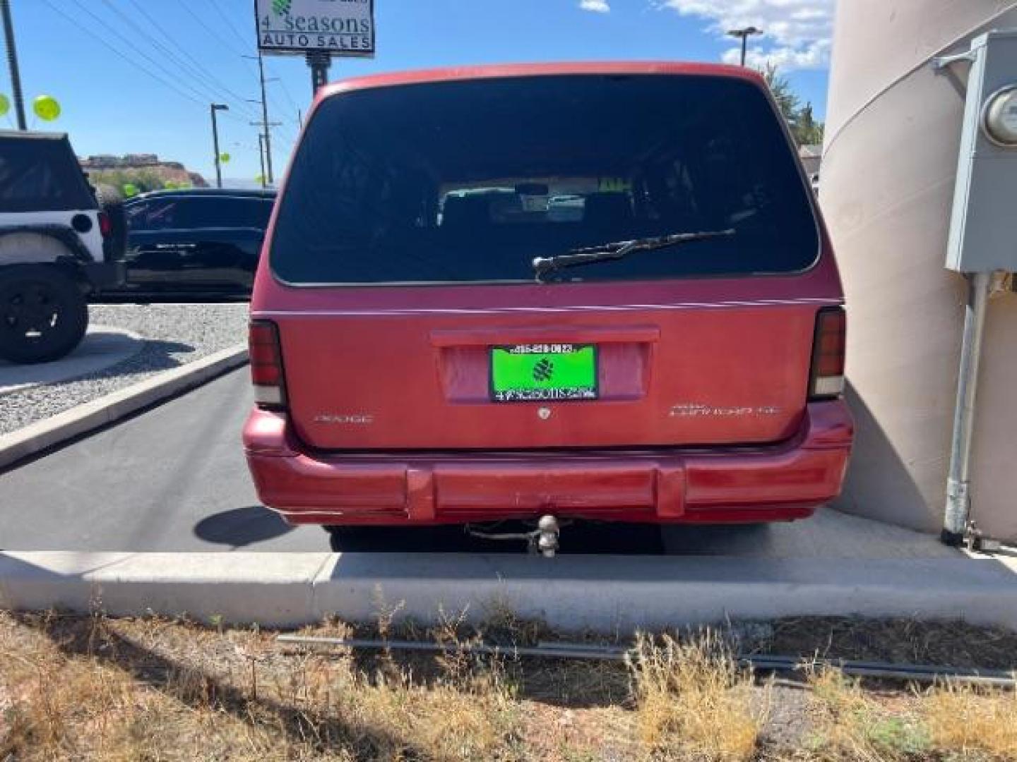 1994 Red /Black Interior Dodge Grand Caravan SE (1B4GH44R7RX) with an 3.3L V6 OHV 12V engine, 4-Speed Automatic transmission, located at 1865 East Red Hills Pkwy, St. George, 84770, (435) 628-0023, 37.120850, -113.543640 - This vehicle is a Wholesale Special. This means it will need some love. Runs a drives fine but has body damage, leaks or other mechanical issues. It did NOT pass our 50 point inspection. Get a great deal on a less than perfect car. These cars do NOT qualify for our in house financing. Cash and carry - Photo#5