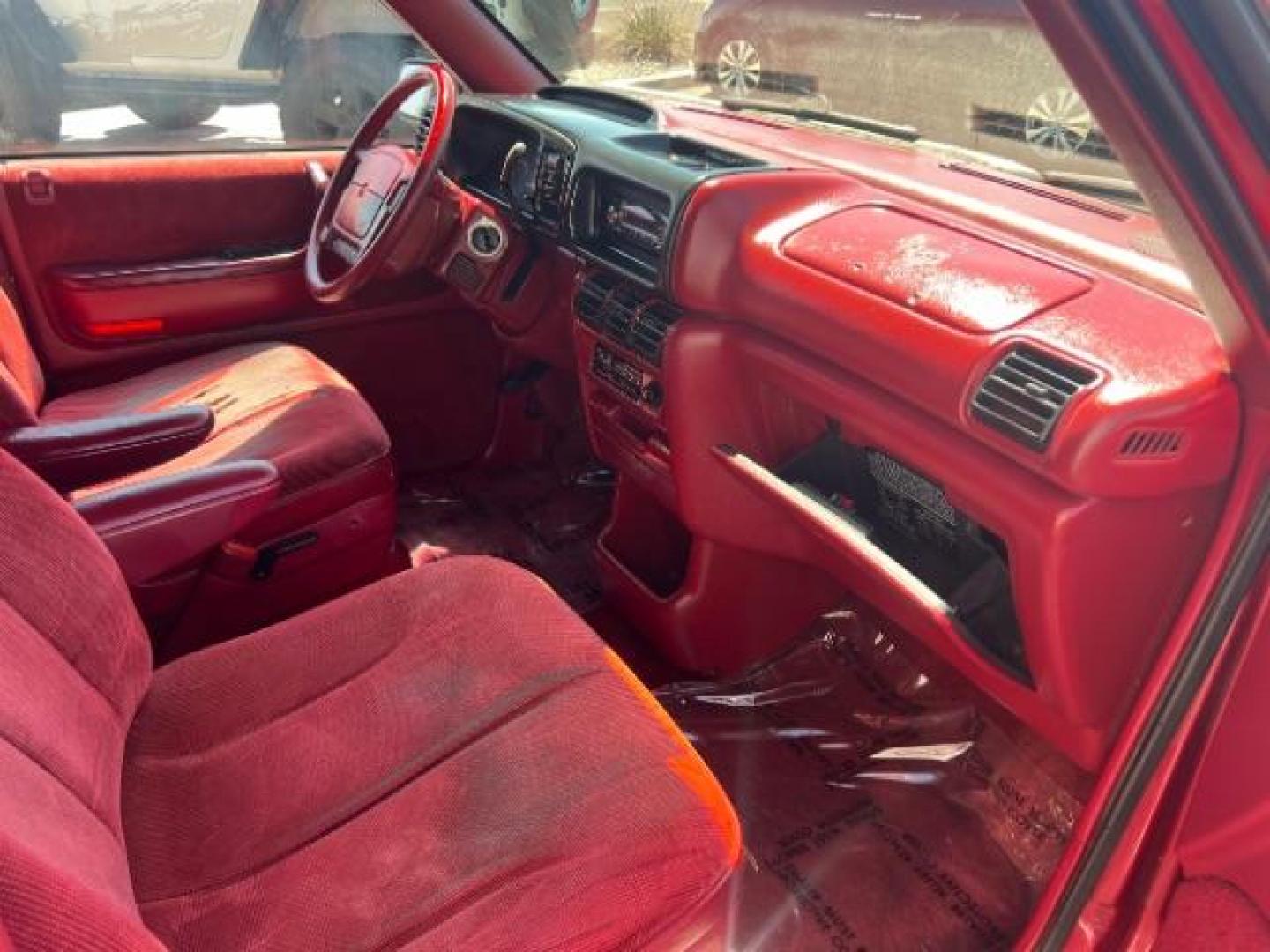 1994 Red /Black Interior Dodge Grand Caravan SE (1B4GH44R7RX) with an 3.3L V6 OHV 12V engine, 4-Speed Automatic transmission, located at 1865 East Red Hills Pkwy, St. George, 84770, (435) 628-0023, 37.120850, -113.543640 - This vehicle is a Wholesale Special. This means it will need some love. Runs a drives fine but has body damage, leaks or other mechanical issues. It did NOT pass our 50 point inspection. Get a great deal on a less than perfect car. These cars do NOT qualify for our in house financing. Cash and carry - Photo#8