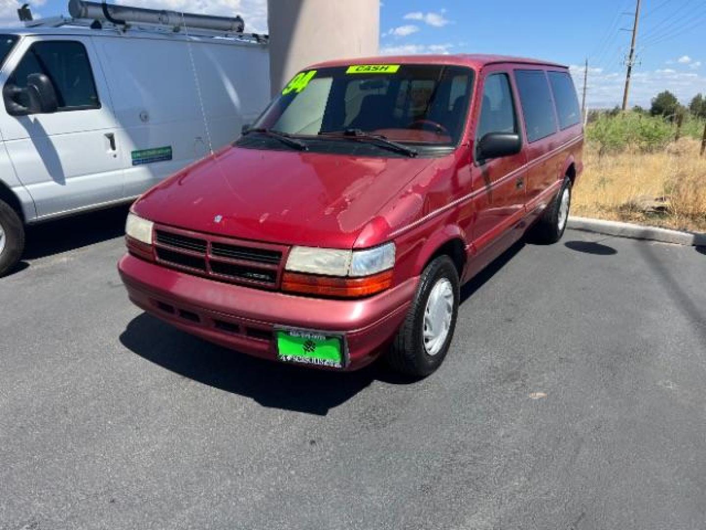 1994 Red /Black Interior Dodge Grand Caravan SE (1B4GH44R7RX) with an 3.3L V6 OHV 12V engine, 4-Speed Automatic transmission, located at 1865 East Red Hills Pkwy, St. George, 84770, (435) 628-0023, 37.120850, -113.543640 - This vehicle is a Wholesale Special. This means it will need some love. Runs a drives fine but has body damage, leaks or other mechanical issues. It did NOT pass our 50 point inspection. Get a great deal on a less than perfect car. These cars do NOT qualify for our in house financing. Cash and carry - Photo#2