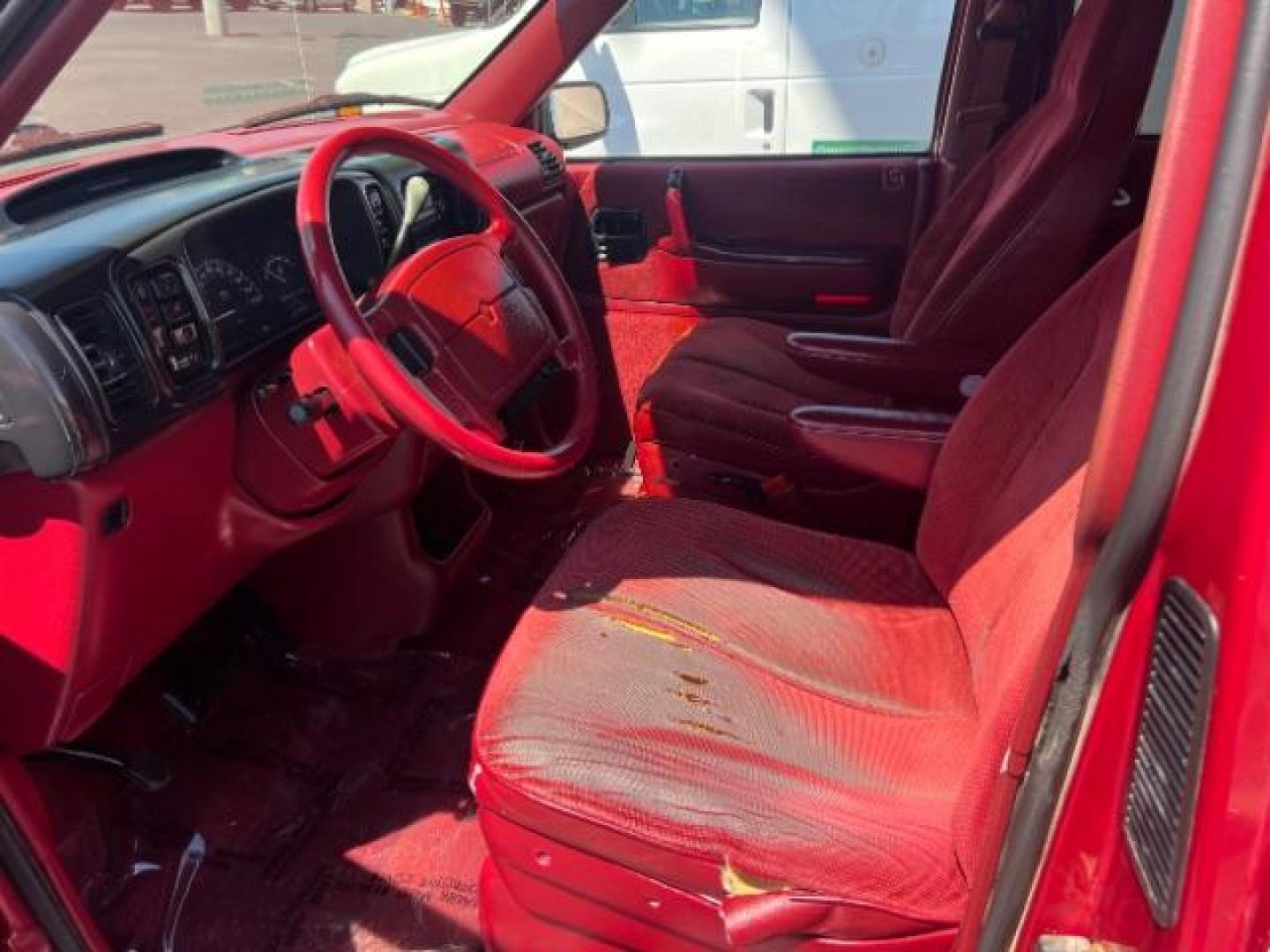 1994 Red /Black Interior Dodge Grand Caravan SE (1B4GH44R7RX) with an 3.3L V6 OHV 12V engine, 4-Speed Automatic transmission, located at 1865 East Red Hills Pkwy, St. George, 84770, (435) 628-0023, 37.120850, -113.543640 - This vehicle is a Wholesale Special. This means it will need some love. Runs a drives fine but has body damage, leaks or other mechanical issues. It did NOT pass our 50 point inspection. Get a great deal on a less than perfect car. These cars do NOT qualify for our in house financing. Cash and carry - Photo#7