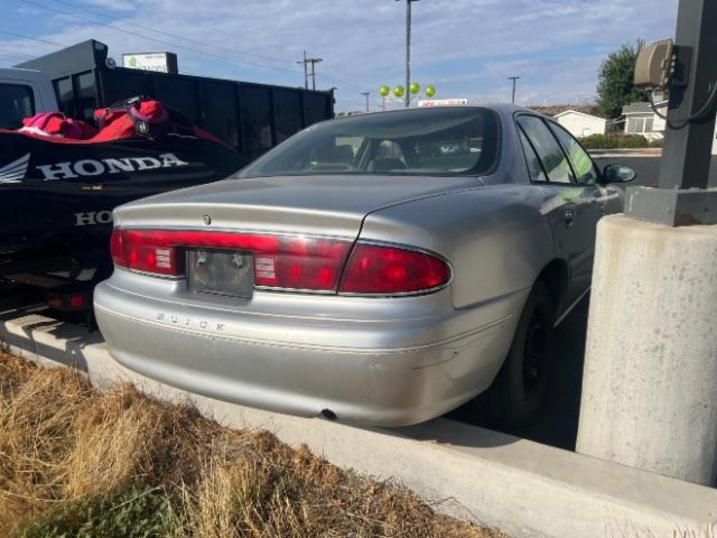 2001 Graphite Metallic /Graphite Cloth Buick Century Custom (2G4WS52J611) with an 3.1L V6 OHV 12V engine, 4-Speed Automatic transmission, located at 1865 East Red Hills Pkwy, St. George, 84770, (435) 628-0023, 37.120850, -113.543640 - This vehicle is a Mechanic Special. This means it will need some love. Runs a drives fine but has body damage, leaks or other mechanical issues. It did NOT pass our 50 point inspection. Get a great deal on a less than perfect car. These cars do NOT qualify for our in house financing. Cash and carry, - Photo#5