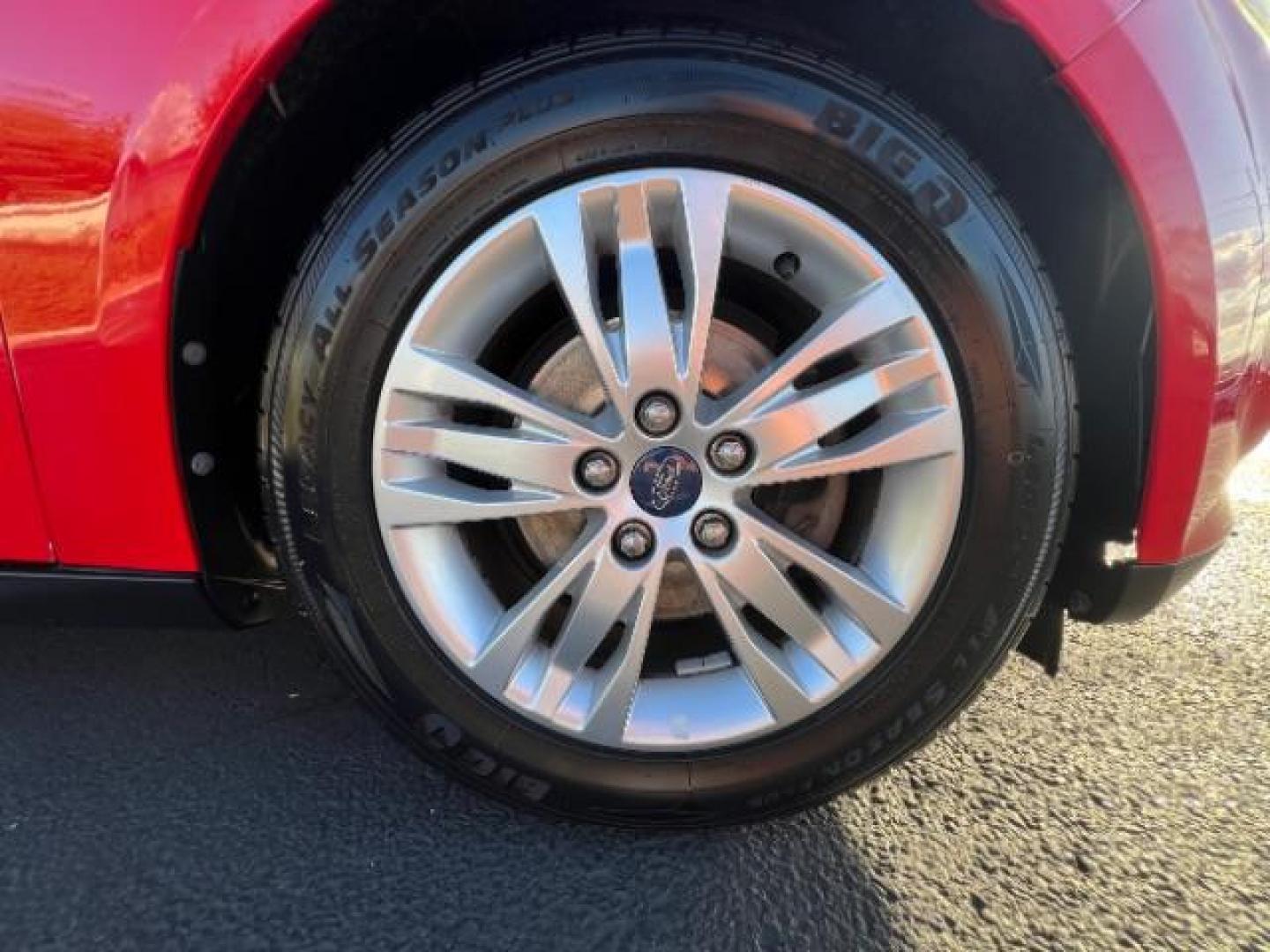 2012 Race Red /Charcoal Black Cloth/Leather Interior Ford Focus SEL Sedan (1FAHP3H29CL) with an 2.0L L4 DOHC 16V engine, 6-Speed Automatic transmission, located at 1865 East Red Hills Pkwy, St. George, 84770, (435) 628-0023, 37.120850, -113.543640 - Photo#10