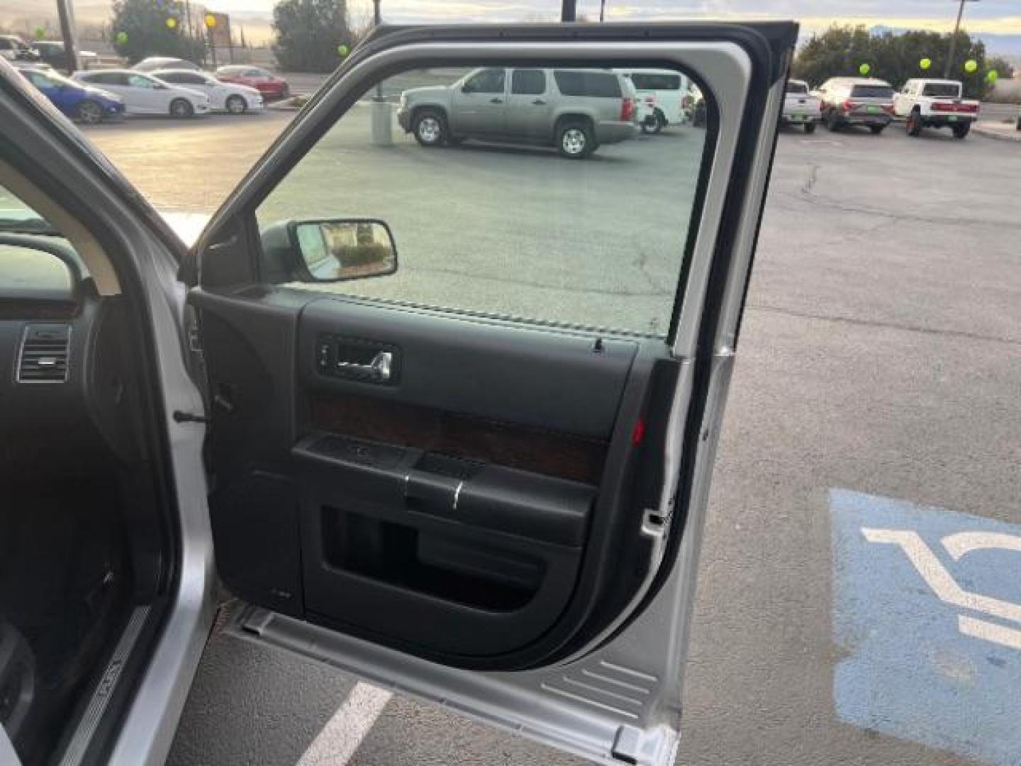 2015 Ingot Silver Metallic /Charcoal Black, leather Ford Flex Limited AWD (2FMHK6D82FB) with an 3.5L V6 DOHC 24V engine, 6-Speed Automatic Overdrive transmission, located at 940 North Main Street, Cedar City, UT, 84720, (435) 628-0023, 37.692936, -113.061897 - We specialize in helping ALL people get the best financing available. No matter your credit score, good, bad or none we can get you an amazing rate. Had a bankruptcy, divorce, or repossessions? We give you the green light to get your credit back on the road. Low down and affordable payments that fit - Photo#31