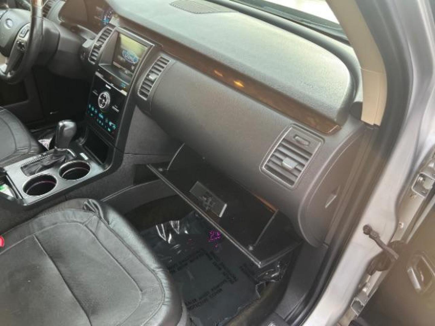 2015 Ingot Silver Metallic /Charcoal Black, leather Ford Flex Limited AWD (2FMHK6D82FB) with an 3.5L V6 DOHC 24V engine, 6-Speed Automatic Overdrive transmission, located at 940 North Main Street, Cedar City, UT, 84720, (435) 628-0023, 37.692936, -113.061897 - We specialize in helping ALL people get the best financing available. No matter your credit score, good, bad or none we can get you an amazing rate. Had a bankruptcy, divorce, or repossessions? We give you the green light to get your credit back on the road. Low down and affordable payments that fit - Photo#33