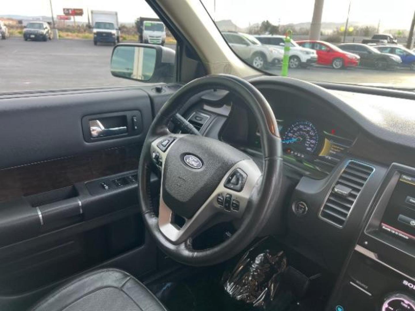 2015 Ingot Silver Metallic /Charcoal Black, leather Ford Flex Limited AWD (2FMHK6D82FB) with an 3.5L V6 DOHC 24V engine, 6-Speed Automatic Overdrive transmission, located at 940 North Main Street, Cedar City, UT, 84720, (435) 628-0023, 37.692936, -113.061897 - We specialize in helping ALL people get the best financing available. No matter your credit score, good, bad or none we can get you an amazing rate. Had a bankruptcy, divorce, or repossessions? We give you the green light to get your credit back on the road. Low down and affordable payments that fit - Photo#34