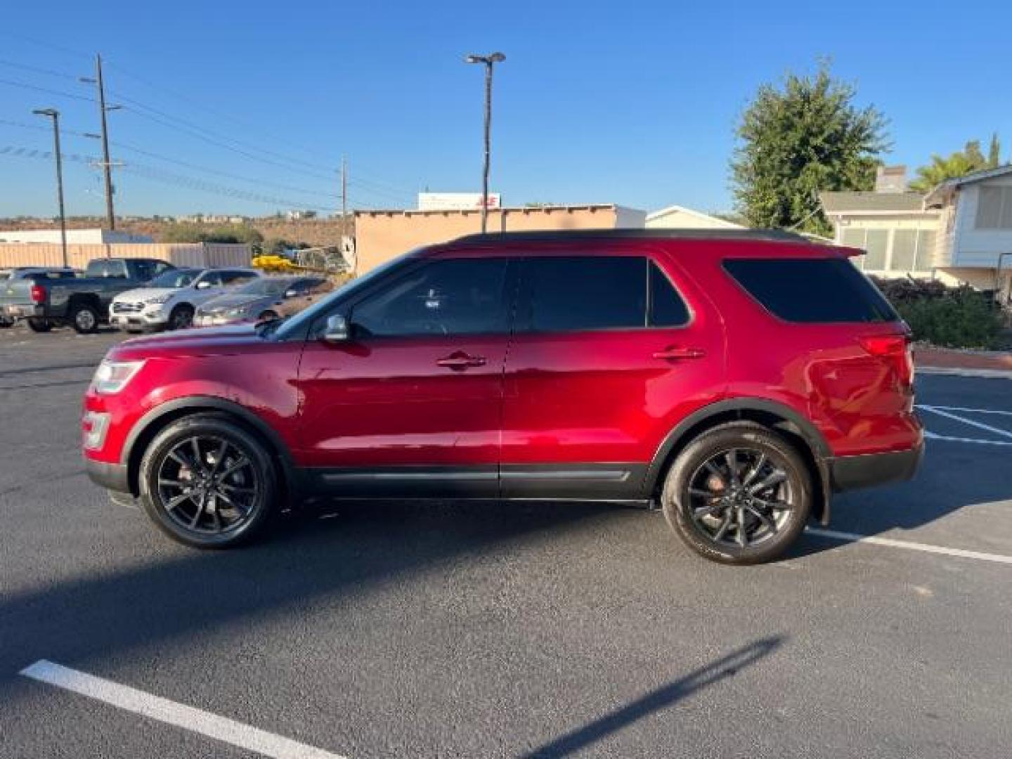 2017 Ruby Red Metallic Tinted Clearcoat /Dark Earth w/Ebony Black, leather/sueded microfibe Ford Explorer XLT FWD (1FM5K7D89HG) with an 3.5L V6 DOHC 24V engine, 6-Speed Automatic transmission, located at 1865 East Red Hills Pkwy, St. George, 84770, (435) 628-0023, 37.120850, -113.543640 - We specialize in helping ALL people get the best financing available. No matter your credit score, good, bad or none we can get you an amazing rate. Had a bankruptcy, divorce, or repossessions? We give you the green light to get your credit back on the road. Low down and affordable payments that fit - Photo#3