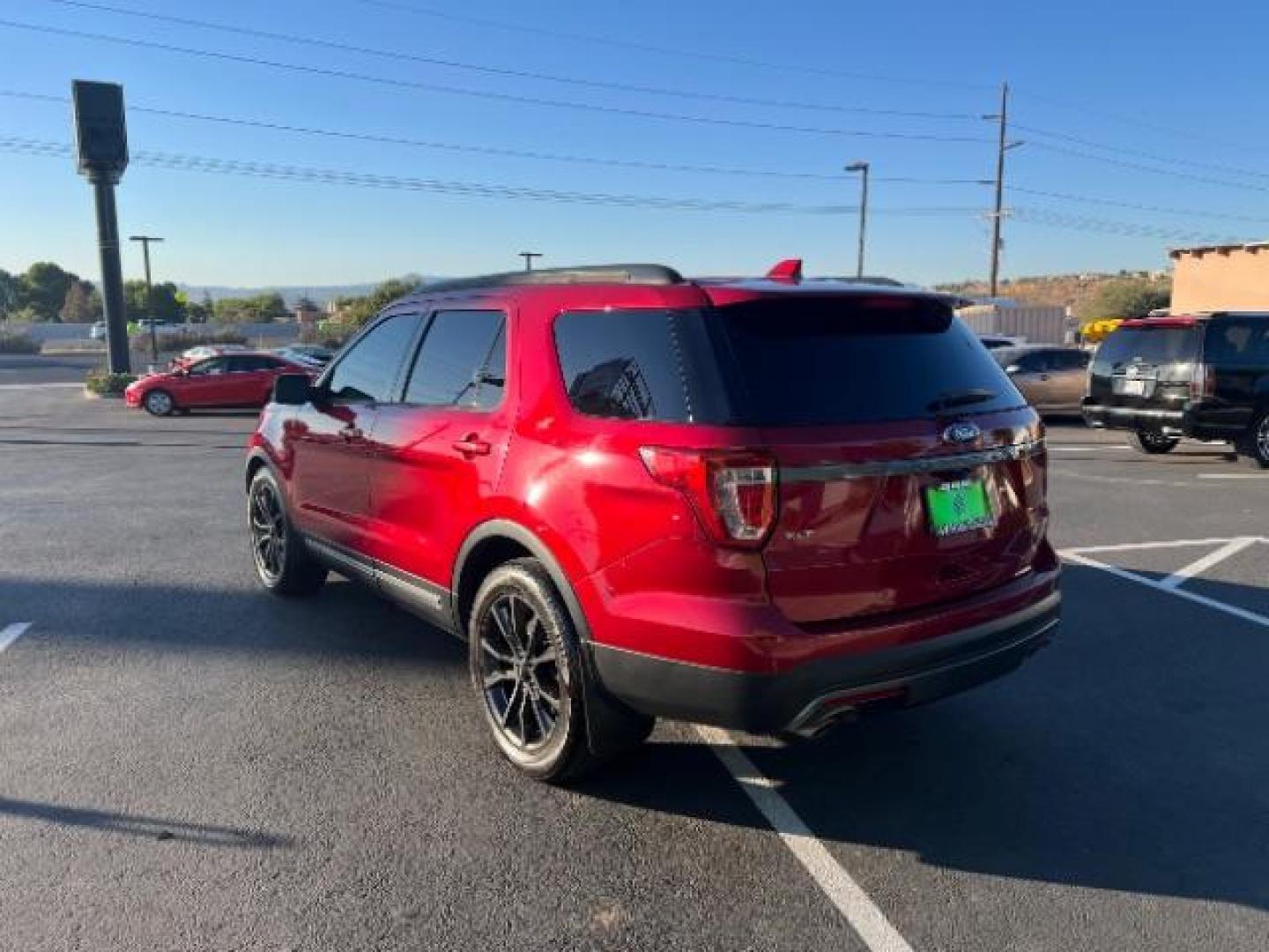 2017 Ruby Red Metallic Tinted Clearcoat /Dark Earth w/Ebony Black, leather/sueded microfibe Ford Explorer XLT FWD (1FM5K7D89HG) with an 3.5L V6 DOHC 24V engine, 6-Speed Automatic transmission, located at 1865 East Red Hills Pkwy, St. George, 84770, (435) 628-0023, 37.120850, -113.543640 - We specialize in helping ALL people get the best financing available. No matter your credit score, good, bad or none we can get you an amazing rate. Had a bankruptcy, divorce, or repossessions? We give you the green light to get your credit back on the road. Low down and affordable payments that fit - Photo#4