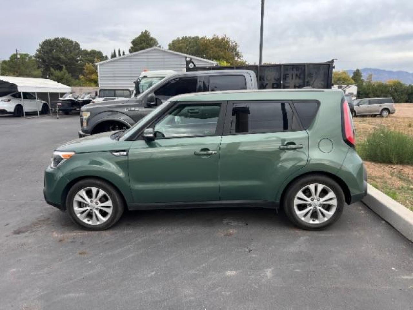 2014 Green /Black Kia Soul + (KNDJP3A5XE7) with an 2.0L L4 DOHC 16V engine, 6-Speed Automatic transmission, located at 1865 East Red Hills Pkwy, St. George, 84770, (435) 628-0023, 37.120850, -113.543640 - This vehicle is a Mechanic Special. This means it will need some love. Runs a drives fine but has body damage, leaks or other mechanical issues. It did NOT pass our 50 point inspection. Get a great deal on a less than perfect car. These cars do NOT qualify for our in house financing. Cash and carry, - Photo#3