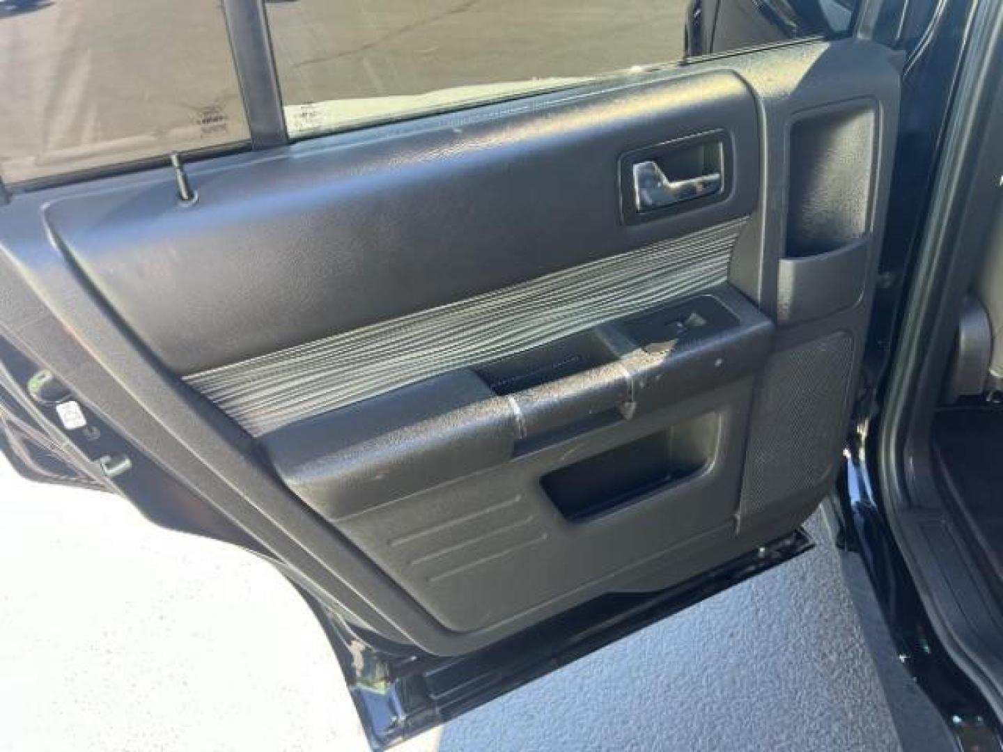2016 Shadow Black /Black Interior Ford Flex SEL FWD (2FMGK5C86GB) with an 3.5L V6 DOHC 24V engine, 6-Speed Automatic Overdrive transmission, located at 940 North Main Street, Cedar City, UT, 84720, (435) 628-0023, 37.692936, -113.061897 - We specialize in helping ALL people get the best financing available. No matter your credit score, good, bad or none we can get you an amazing rate. Had a bankruptcy, divorce, or repossessions? We give you the green light to get your credit back on the road. Low down and affordable payments that fit - Photo#19