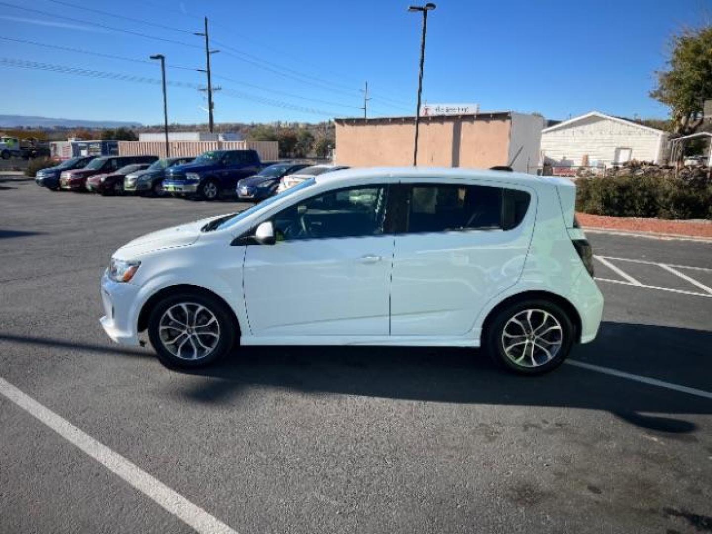 2017 Summit White /Dark Pewter/Dark Titanium, premium cloth Chevrolet Sonic LT Manual 5-Door (1G1JC6SBXH4) with an 1.4L L4 DOHC 24V TURBO engine, 5-Speed Manual transmission, located at 1865 East Red Hills Pkwy, St. George, 84770, (435) 628-0023, 37.120850, -113.543640 - We specialize in helping ALL people get the best financing available. No matter your credit score, good, bad or none we can get you an amazing rate. Had a bankruptcy, divorce, or repossessions? We give you the green light to get your credit back on the road. Low down and affordable payments that fit - Photo#3