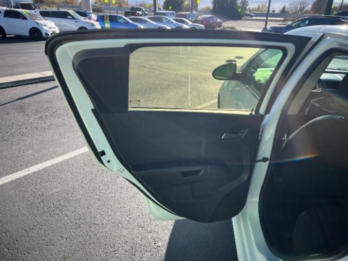 2017 Summit White /Dark Pewter/Dark Titanium, premium cloth Chevrolet Sonic LT Manual 5-Door (1G1JC6SBXH4) with an 1.4L L4 DOHC 24V TURBO engine, 5-Speed Manual transmission, located at 1865 East Red Hills Pkwy, St. George, 84770, (435) 628-0023, 37.120850, -113.543640 - We specialize in helping ALL people get the best financing available. No matter your credit score, good, bad or none we can get you an amazing rate. Had a bankruptcy, divorce, or repossessions? We give you the green light to get your credit back on the road. Low down and affordable payments that fit - Photo#19