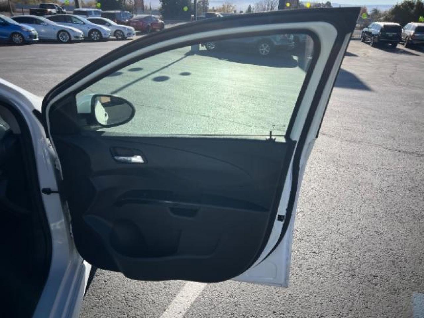 2017 Summit White /Dark Pewter/Dark Titanium, premium cloth Chevrolet Sonic LT Manual 5-Door (1G1JC6SBXH4) with an 1.4L L4 DOHC 24V TURBO engine, 5-Speed Manual transmission, located at 1865 East Red Hills Pkwy, St. George, 84770, (435) 628-0023, 37.120850, -113.543640 - We specialize in helping ALL people get the best financing available. No matter your credit score, good, bad or none we can get you an amazing rate. Had a bankruptcy, divorce, or repossessions? We give you the green light to get your credit back on the road. Low down and affordable payments that fit - Photo#24