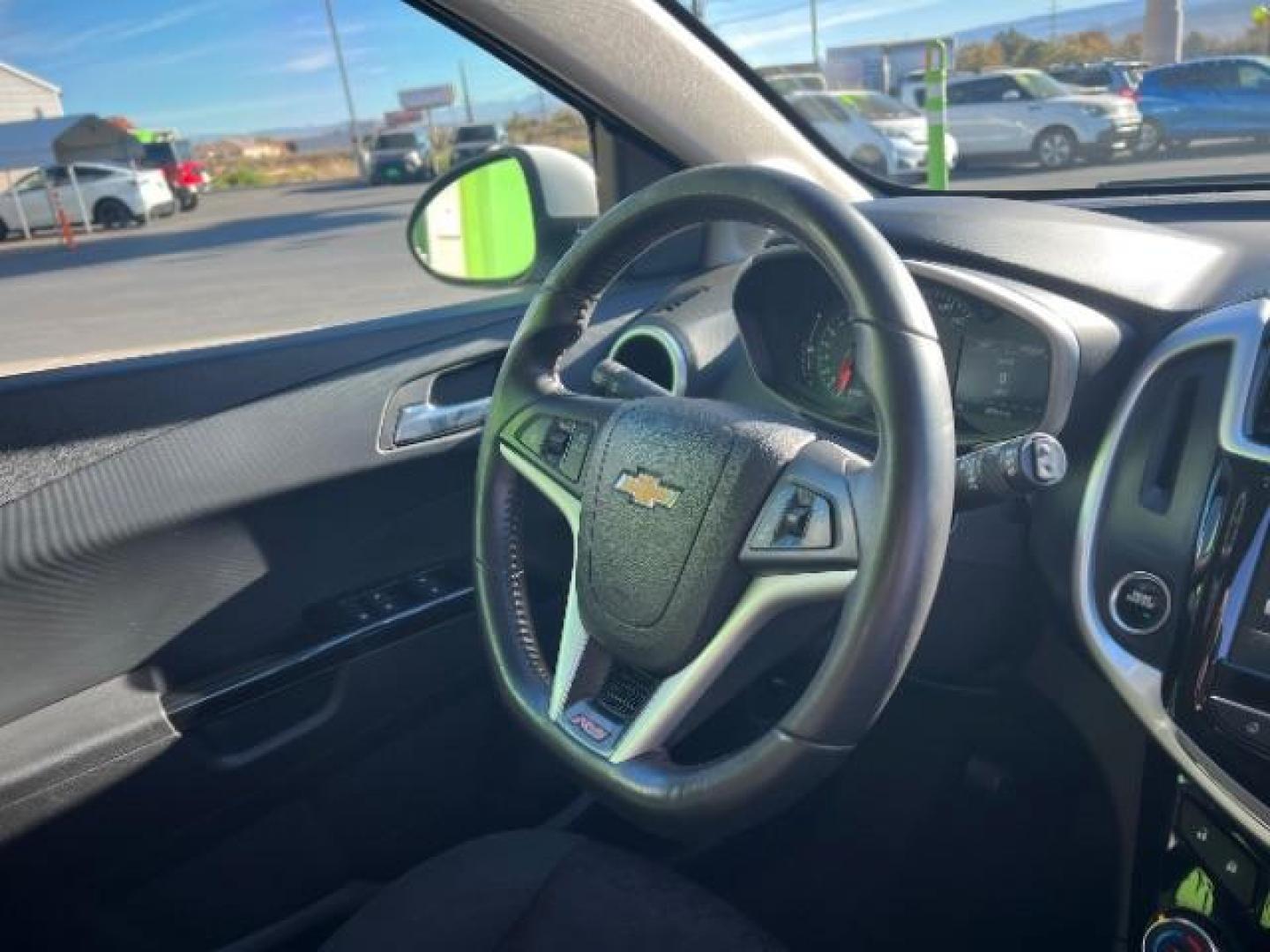 2017 Summit White /Dark Pewter/Dark Titanium, premium cloth Chevrolet Sonic LT Manual 5-Door (1G1JC6SBXH4) with an 1.4L L4 DOHC 24V TURBO engine, 5-Speed Manual transmission, located at 1865 East Red Hills Pkwy, St. George, 84770, (435) 628-0023, 37.120850, -113.543640 - We specialize in helping ALL people get the best financing available. No matter your credit score, good, bad or none we can get you an amazing rate. Had a bankruptcy, divorce, or repossessions? We give you the green light to get your credit back on the road. Low down and affordable payments that fit - Photo#27