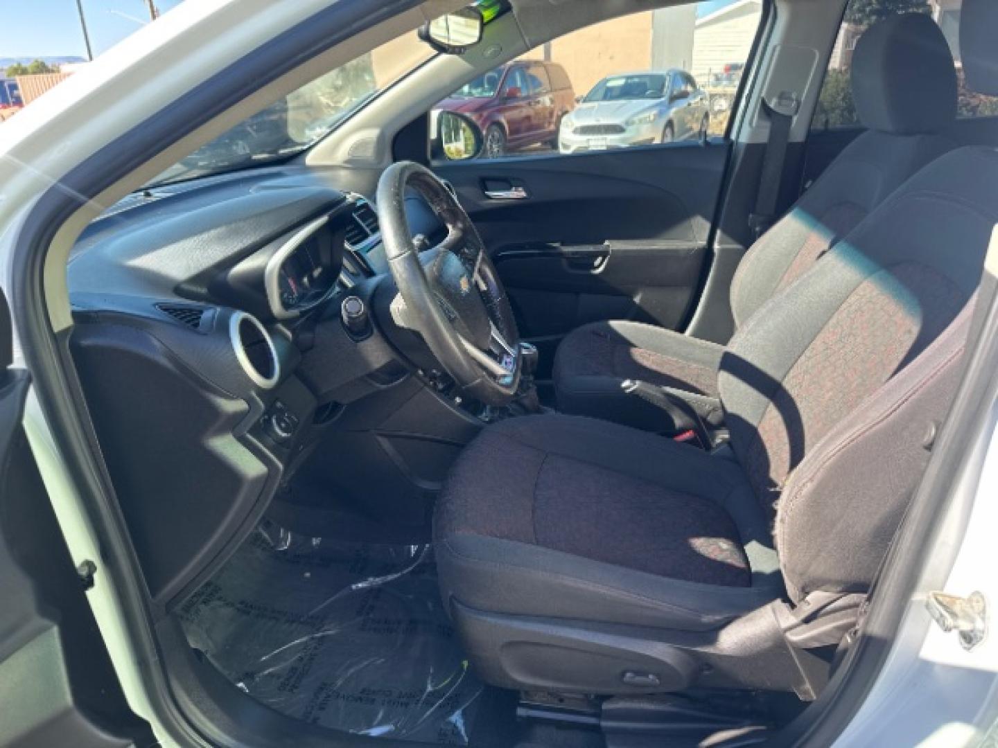 2017 Summit White /Dark Pewter/Dark Titanium, premium cloth Chevrolet Sonic LT Manual 5-Door (1G1JC6SBXH4) with an 1.4L L4 DOHC 24V TURBO engine, 5-Speed Manual transmission, located at 1865 East Red Hills Pkwy, St. George, 84770, (435) 628-0023, 37.120850, -113.543640- Photo#15