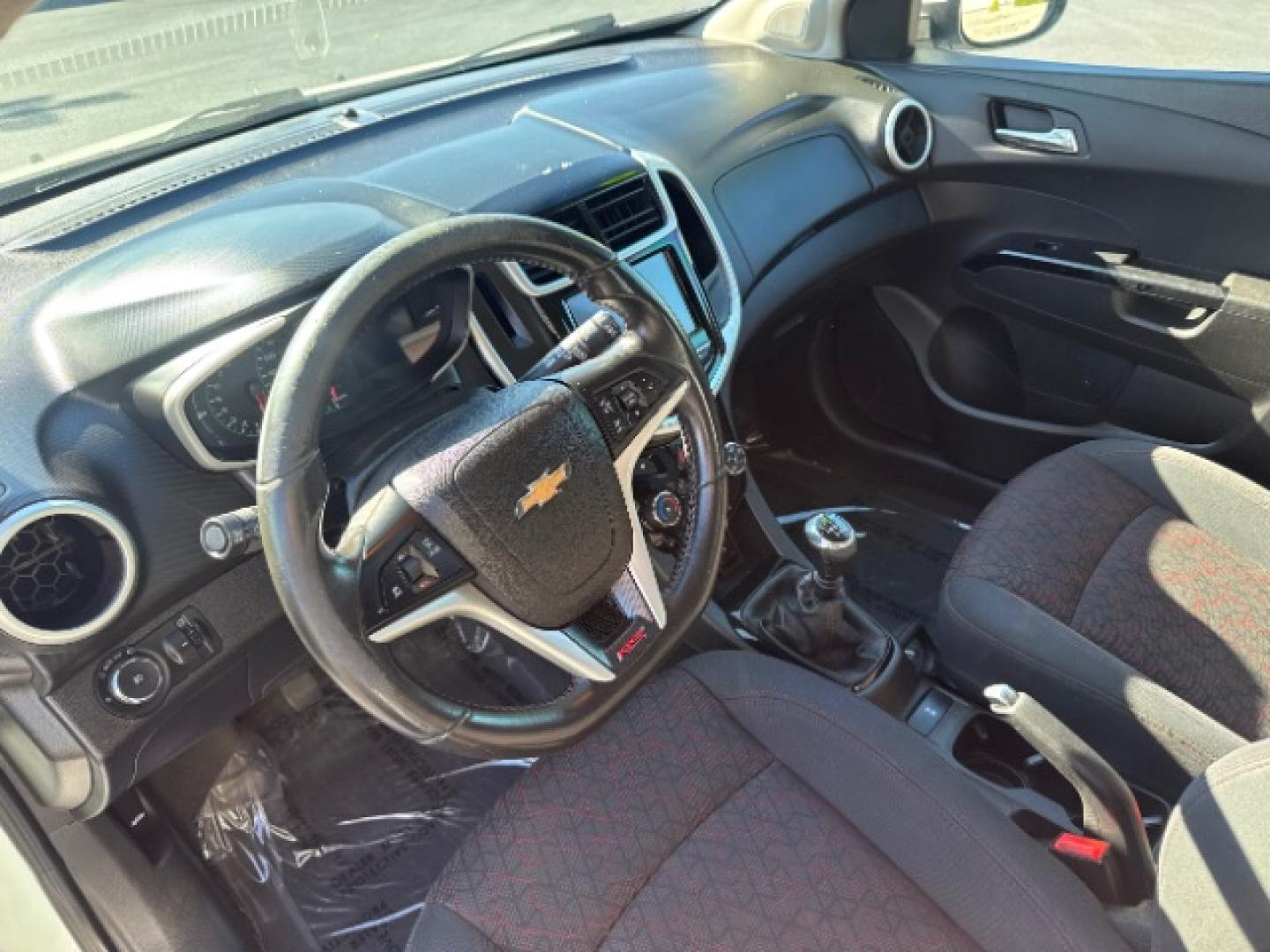 2017 Summit White /Dark Pewter/Dark Titanium, premium cloth Chevrolet Sonic LT Manual 5-Door (1G1JC6SBXH4) with an 1.4L L4 DOHC 24V TURBO engine, 5-Speed Manual transmission, located at 1865 East Red Hills Pkwy, St. George, 84770, (435) 628-0023, 37.120850, -113.543640- Photo#21