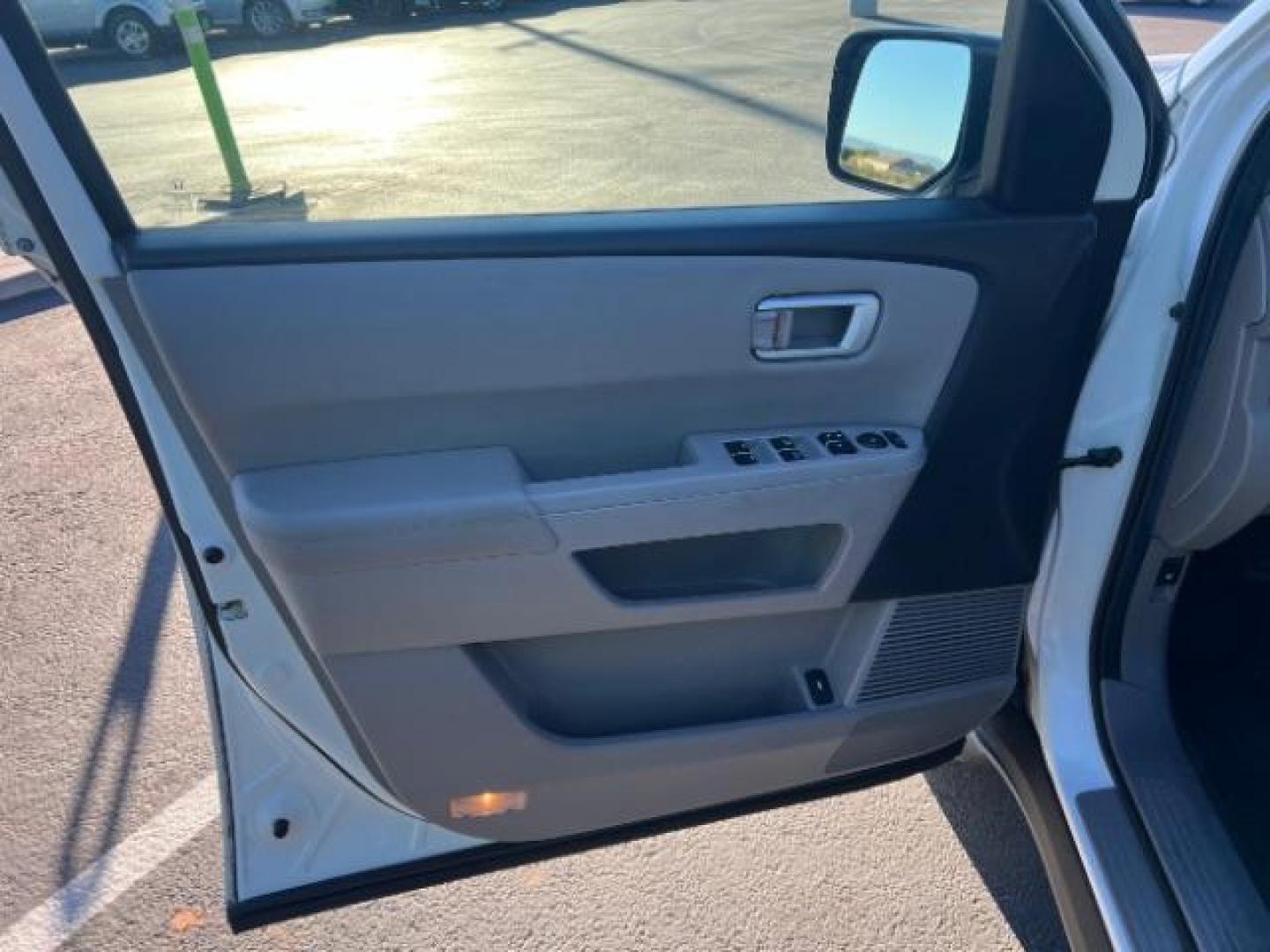 2013 Taffeta White /Beige Leather Interior Honda Pilot EX-L 4WD 5-Spd AT (5FNYF4H50DB) with an 3.5L V6 SOHC 24V engine, 5-Speed Automatic transmission, located at 1865 East Red Hills Pkwy, St. George, 84770, (435) 628-0023, 37.120850, -113.543640 - We specialize in helping ALL people get the best financing available. No matter your credit score, good, bad or none we can get you an amazing rate. Had a bankruptcy, divorce, or repossessions? We give you the green light to get your credit back on the road. Low down and affordable payments that fit - Photo#13