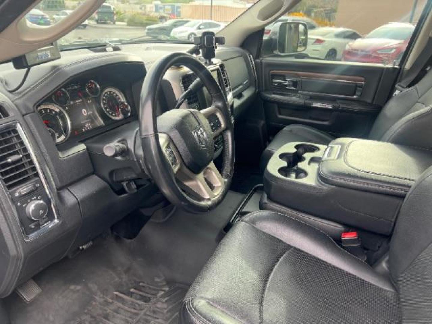 2017 Granite Crystal Metallic Clear Coat /Black/Diesel Gray, vinyl RAM 3500 Laramie Crew Cab LWB 4WD DRW (3C63RRJL2HG) with an 6.7L L6 OHV 24V TURBO DIESEL engine, 6-Speed Automatic transmission, located at 1865 East Red Hills Pkwy, St. George, 84770, (435) 628-0023, 37.120850, -113.543640 - Get ready to tackle any job with this beastly 2017 Ram 3500 Crew Cab Laramie 4WD! Under the hood, you'll find a 6.7L I6 Cummins Turbo Diesel Engine paired with a 6-Speed Automatic Aisin AS69RC Heavy Duty Transmission, delivering the power and performance you need. With a 4.10 Axle Ratio and a Gross - Photo#19