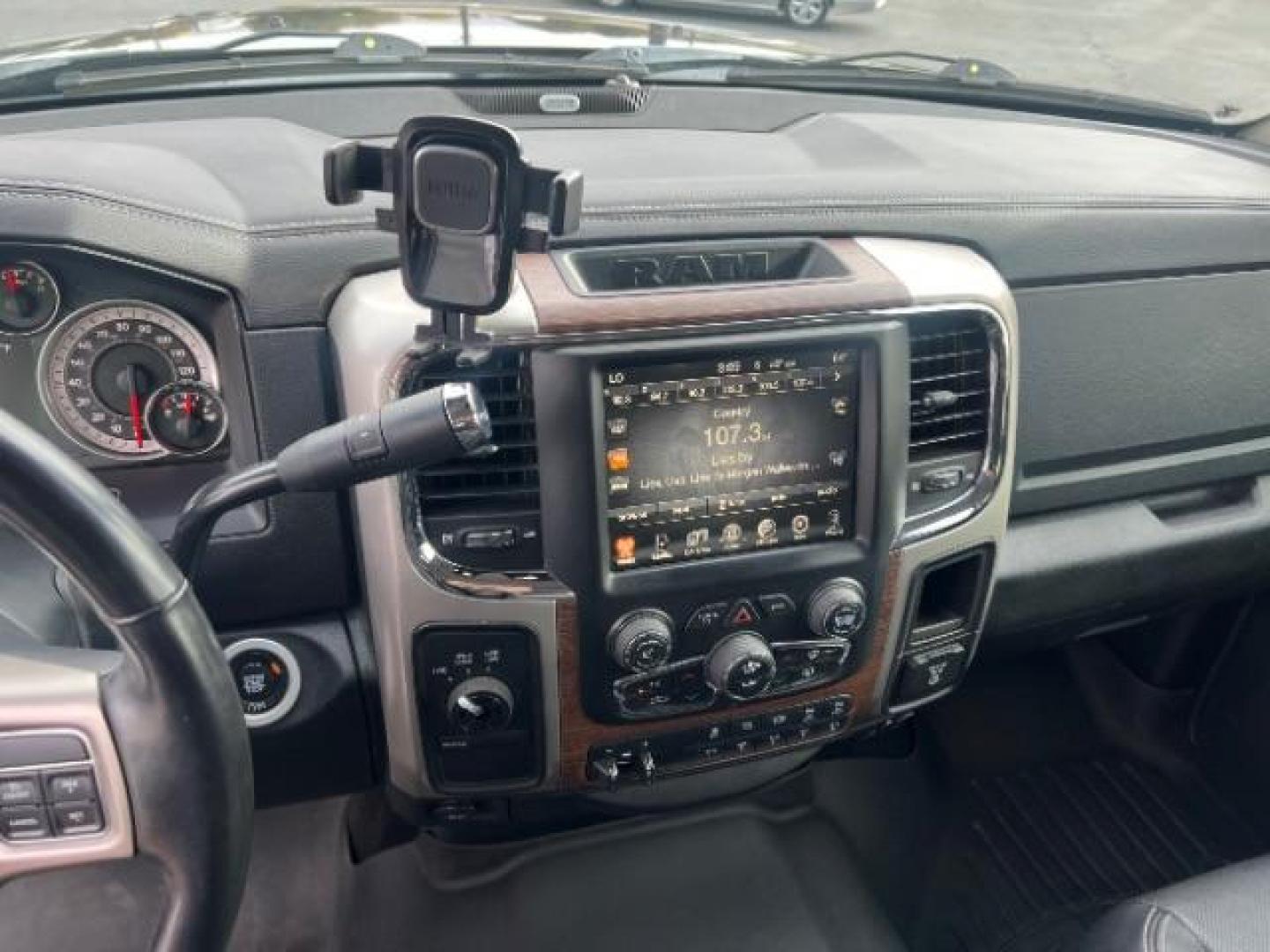 2017 Granite Crystal Metallic Clear Coat /Black/Diesel Gray, vinyl RAM 3500 Laramie Crew Cab LWB 4WD DRW (3C63RRJL2HG) with an 6.7L L6 OHV 24V TURBO DIESEL engine, 6-Speed Automatic transmission, located at 1865 East Red Hills Pkwy, St. George, 84770, (435) 628-0023, 37.120850, -113.543640 - Get ready to tackle any job with this beastly 2017 Ram 3500 Crew Cab Laramie 4WD! Under the hood, you'll find a 6.7L I6 Cummins Turbo Diesel Engine paired with a 6-Speed Automatic Aisin AS69RC Heavy Duty Transmission, delivering the power and performance you need. With a 4.10 Axle Ratio and a Gross - Photo#21