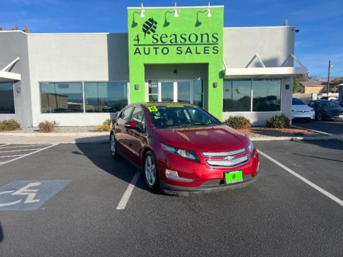 2013 Red /Black Leather Interior Chevrolet Volt Premium w/ LEP (1G1RF6E46DU) with an 1.4L L4 DOHC 16V PLUG-IN HYBRID engine, Continuously Variable Transmission transmission, located at 940 North Main Street, Cedar City, UT, 84720, (435) 628-0023, 37.692936, -113.061897 - ***This vehicle qualifies for the EV/Hybrid tax rebate of up to $4,000*** We are setup with the IRS to recieve direct payments within 72 hours. We file the rebate online with IRS and can credit it to your down payment, reduce the sales price OR give you cashback!! These cars will not last and can o - Photo#0