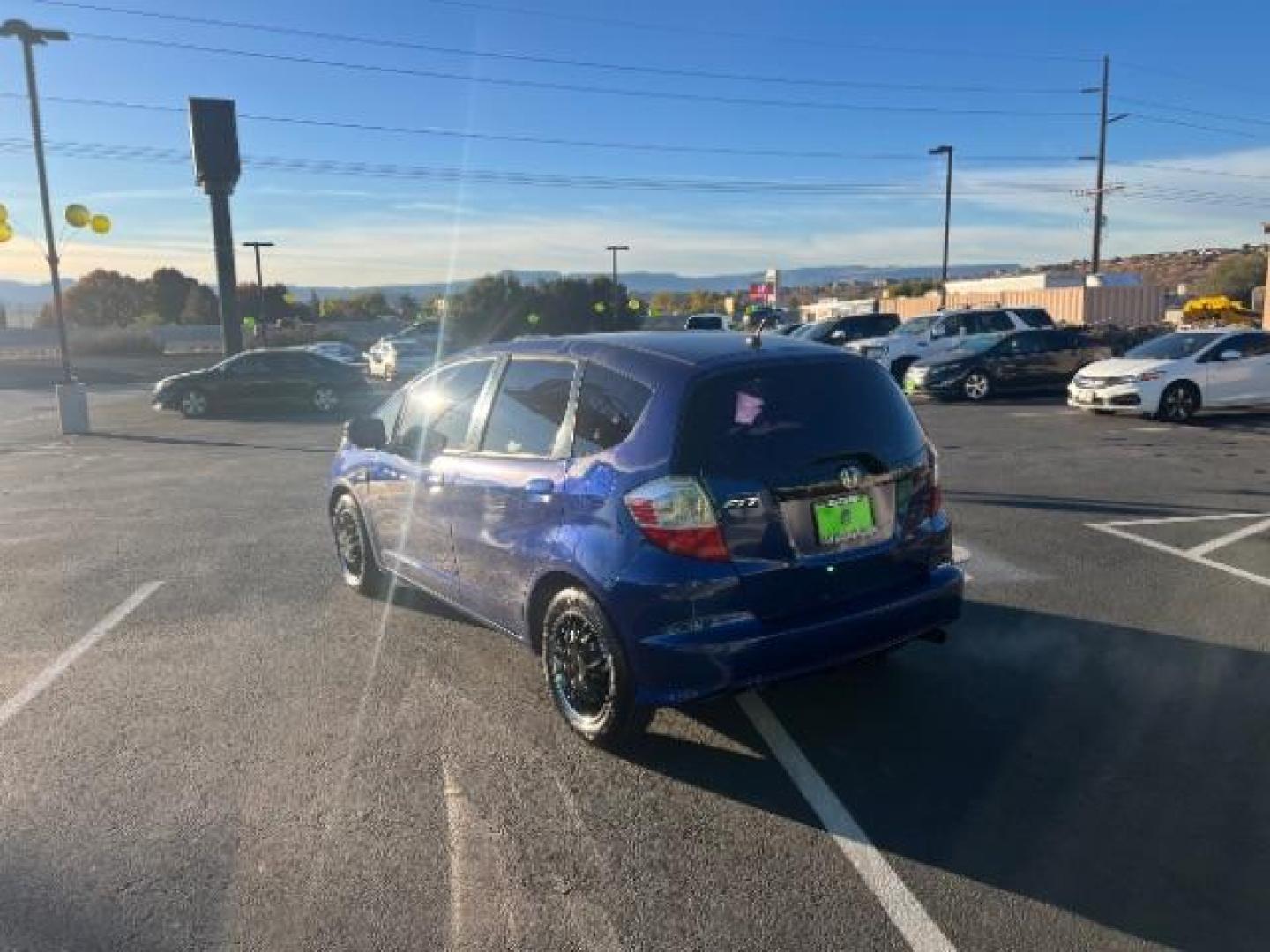 2010 Blue Sensation Pearl /Gray Cloth Interior Honda Fit 5-Speed AT (JHMGE8H28AS) with an 1.5L L4 SOHC 16V engine, 5-Speed Automatic transmission, located at 940 North Main Street, Cedar City, UT, 84720, (435) 628-0023, 37.692936, -113.061897 - Photo#4