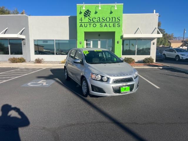 2013 Silver Ice Metallic /Dark Pewter/Dark Titanium Cloth Interior Chevrolet Sonic LT Auto 5-Door (1G1JC6SG9D4) with an 1.8L L4 DOHC 24V engine, 6-Speed Automatic transmission, located at 1865 East Red Hills Pkwy, St. George, 84770, (435) 628-0023, 37.120850, -113.543640 - We specialize in helping ALL people get the best financing available. No matter your credit score, good, bad or none we can get you an amazing rate. Had a bankruptcy, divorce, or repossessions? We give you the green light to get your credit back on the road. Low down and affordable payments that fit - Photo#0