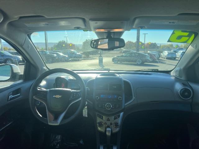 2013 Silver Ice Metallic /Dark Pewter/Dark Titanium Cloth Interior Chevrolet Sonic LT Auto 5-Door (1G1JC6SG9D4) with an 1.8L L4 DOHC 24V engine, 6-Speed Automatic transmission, located at 1865 East Red Hills Pkwy, St. George, 84770, (435) 628-0023, 37.120850, -113.543640 - We specialize in helping ALL people get the best financing available. No matter your credit score, good, bad or none we can get you an amazing rate. Had a bankruptcy, divorce, or repossessions? We give you the green light to get your credit back on the road. Low down and affordable payments that fit - Photo#22