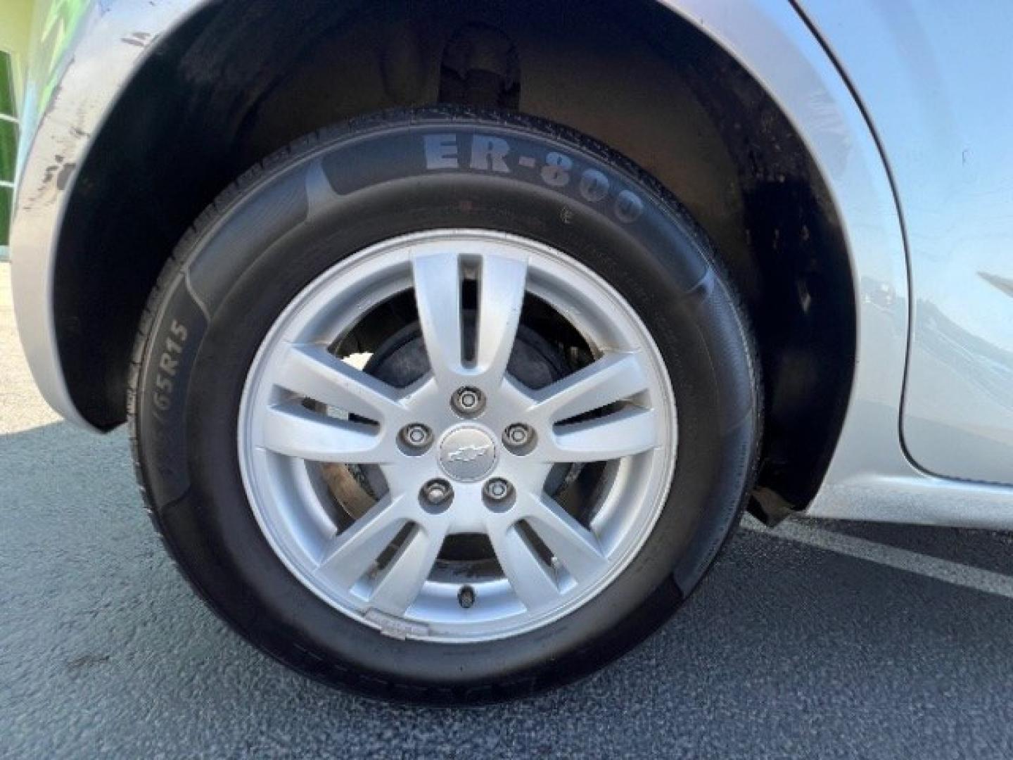 2013 Silver Ice Metallic /Dark Pewter/Dark Titanium Cloth Interior Chevrolet Sonic LT Auto 5-Door (1G1JC6SG9D4) with an 1.8L L4 DOHC 24V engine, 6-Speed Automatic transmission, located at 940 North Main Street, Cedar City, UT, 84720, (435) 628-0023, 37.692936, -113.061897 - We specialize in helping ALL people get the best financing available. No matter your credit score, good, bad or none we can get you an amazing rate. Had a bankruptcy, divorce, or repossessions? We give you the green light to get your credit back on the road. Low down and affordable payments that fit- Photo#9
