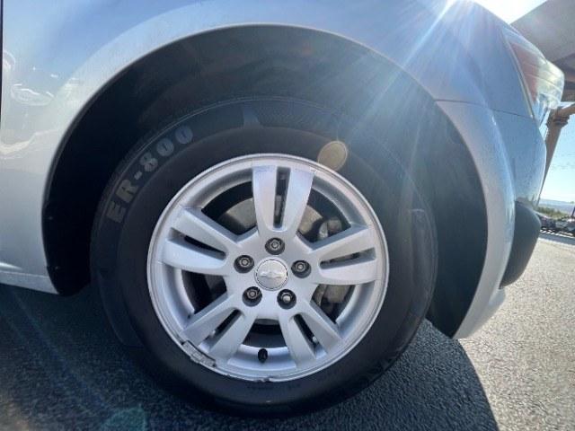 2013 Silver Ice Metallic /Dark Pewter/Dark Titanium Cloth Interior Chevrolet Sonic LT Auto 5-Door (1G1JC6SG9D4) with an 1.8L L4 DOHC 24V engine, 6-Speed Automatic transmission, located at 940 North Main Street, Cedar City, UT, 84720, (435) 628-0023, 37.692936, -113.061897 - We specialize in helping ALL people get the best financing available. No matter your credit score, good, bad or none we can get you an amazing rate. Had a bankruptcy, divorce, or repossessions? We give you the green light to get your credit back on the road. Low down and affordable payments that fit- Photo#10