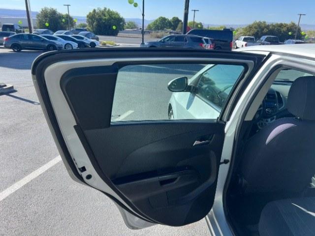 2013 Silver Ice Metallic /Dark Pewter/Dark Titanium Cloth Interior Chevrolet Sonic LT Auto 5-Door (1G1JC6SG9D4) with an 1.8L L4 DOHC 24V engine, 6-Speed Automatic transmission, located at 940 North Main Street, Cedar City, UT, 84720, (435) 628-0023, 37.692936, -113.061897 - We specialize in helping ALL people get the best financing available. No matter your credit score, good, bad or none we can get you an amazing rate. Had a bankruptcy, divorce, or repossessions? We give you the green light to get your credit back on the road. Low down and affordable payments that fit- Photo#19