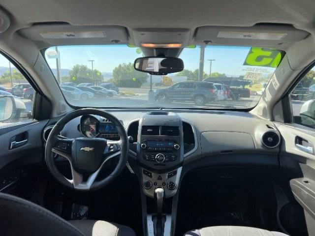 2013 Silver Ice Metallic /Dark Pewter/Dark Titanium Cloth Interior Chevrolet Sonic LT Auto 5-Door (1G1JC6SG9D4) with an 1.8L L4 DOHC 24V engine, 6-Speed Automatic transmission, located at 940 North Main Street, Cedar City, UT, 84720, (435) 628-0023, 37.692936, -113.061897 - We specialize in helping ALL people get the best financing available. No matter your credit score, good, bad or none we can get you an amazing rate. Had a bankruptcy, divorce, or repossessions? We give you the green light to get your credit back on the road. Low down and affordable payments that fit- Photo#21